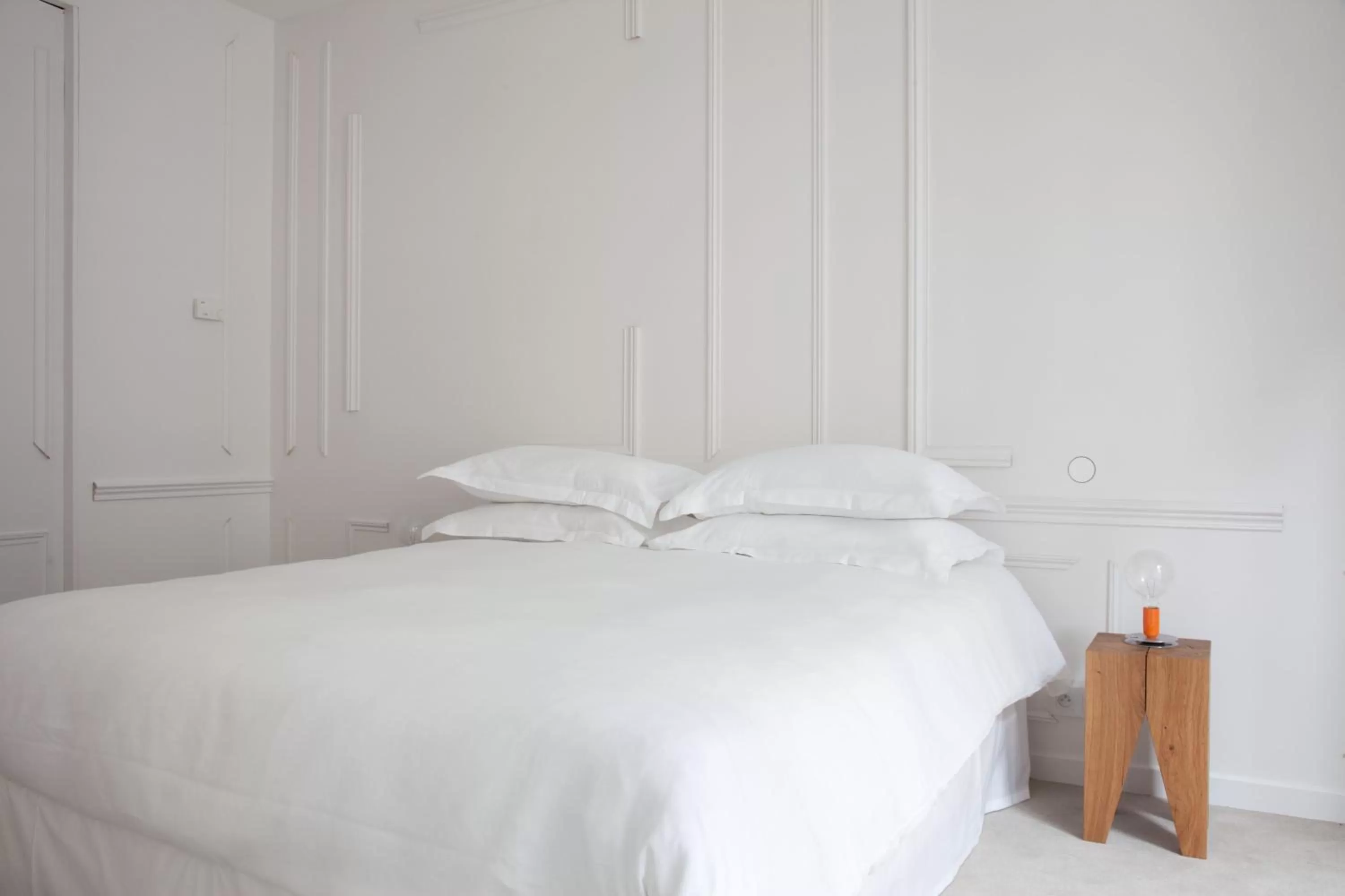 Bed in La Maison Champs Elysées