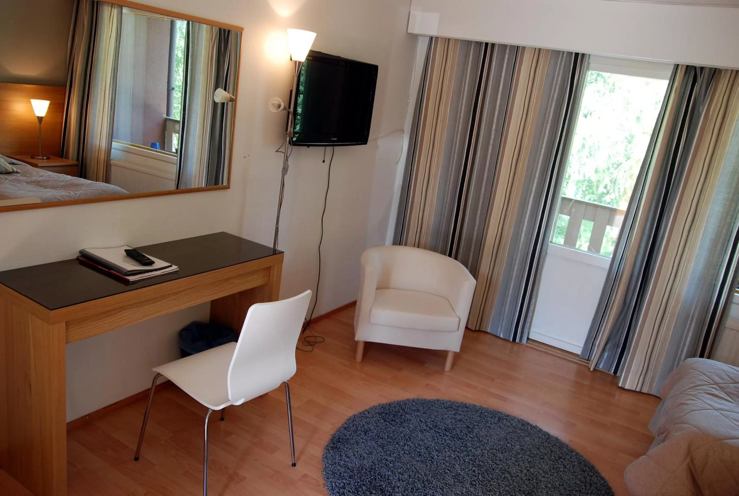 Bed in Revontuli Resort Rooms