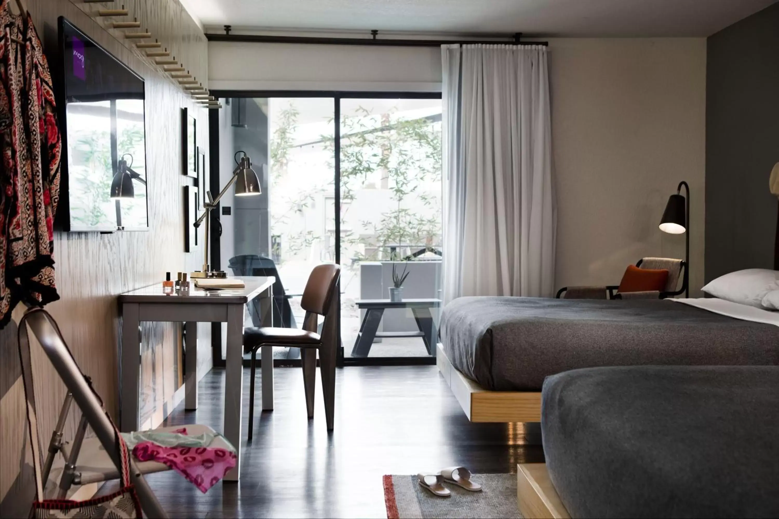 Ground Floor Queen Room with Two Queen Beds and Poolside View in MOXY Phoenix Tempe/ASU Area Ground Floor Queen Room with Two Queen Beds and Poolside View in MOXY Phoenix Tempe/ASU Area