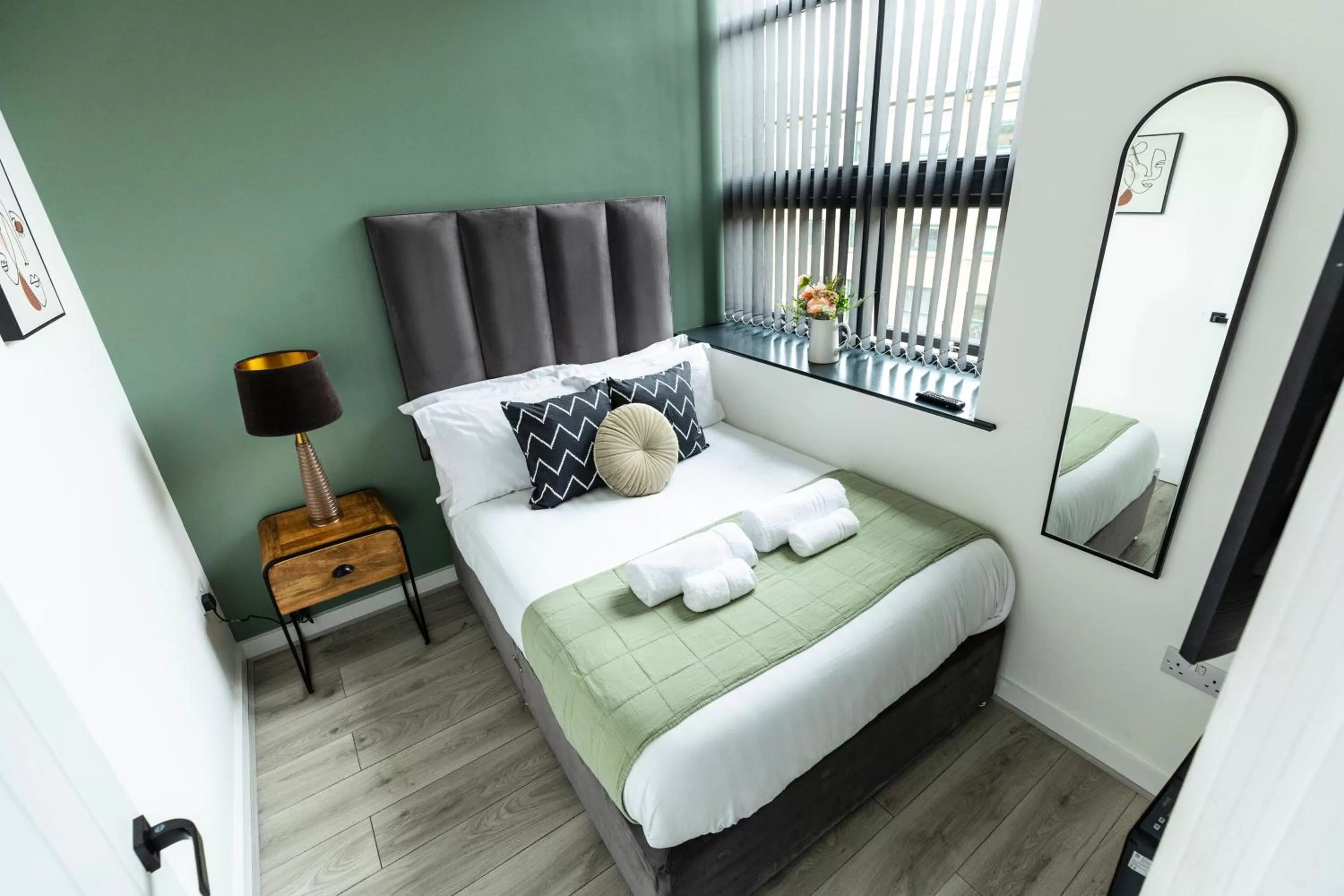 Bed in Spire Accommodations Ltd