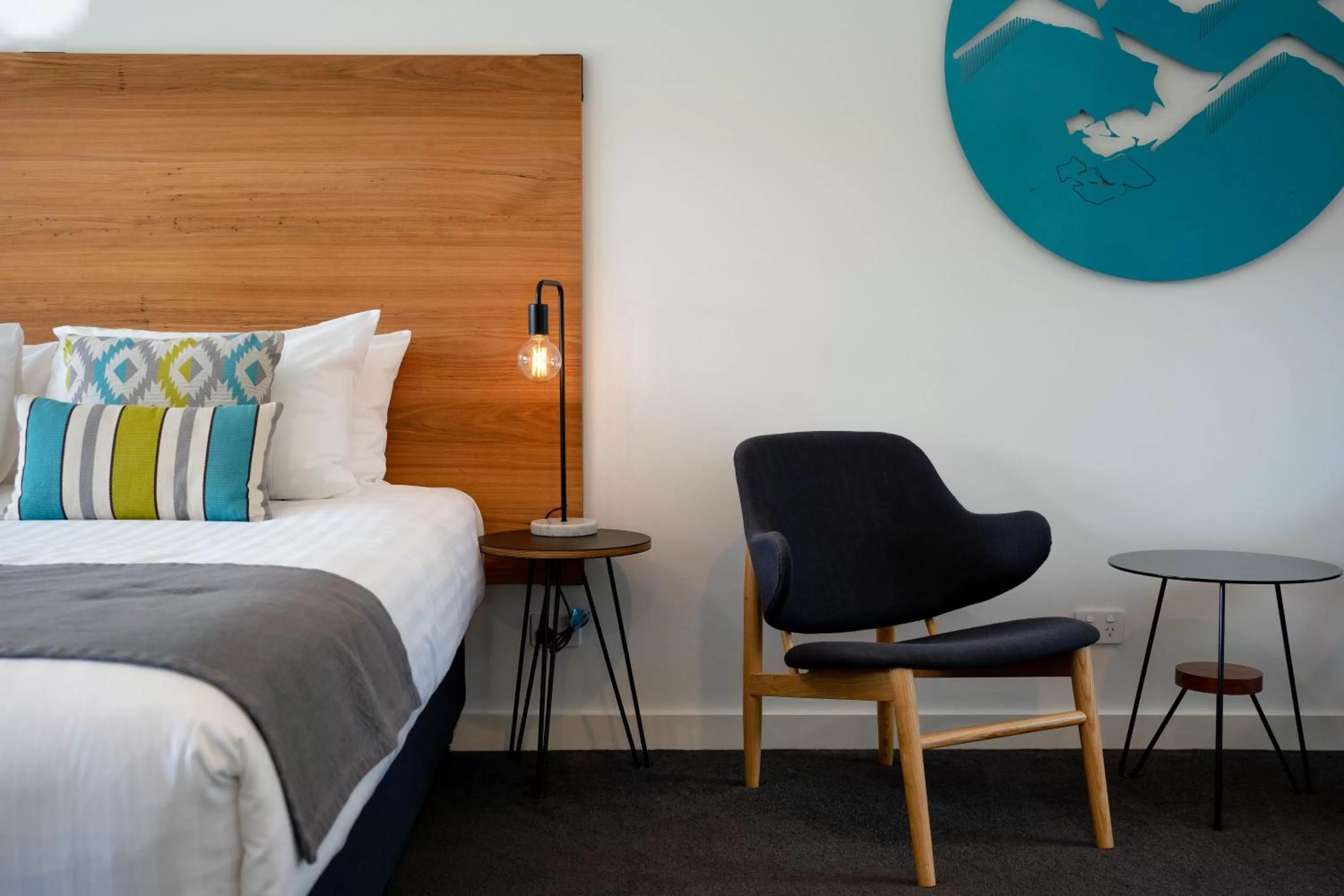 Bed in Bright Colonial Motel