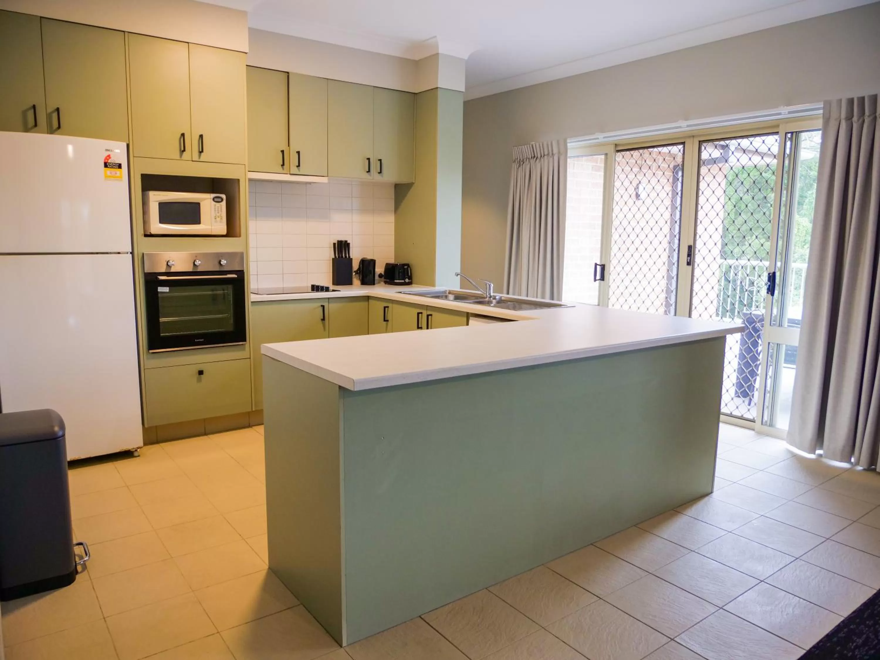 Kitchen or kitchenette in Nightcap at Hinterland Hotel Nerang