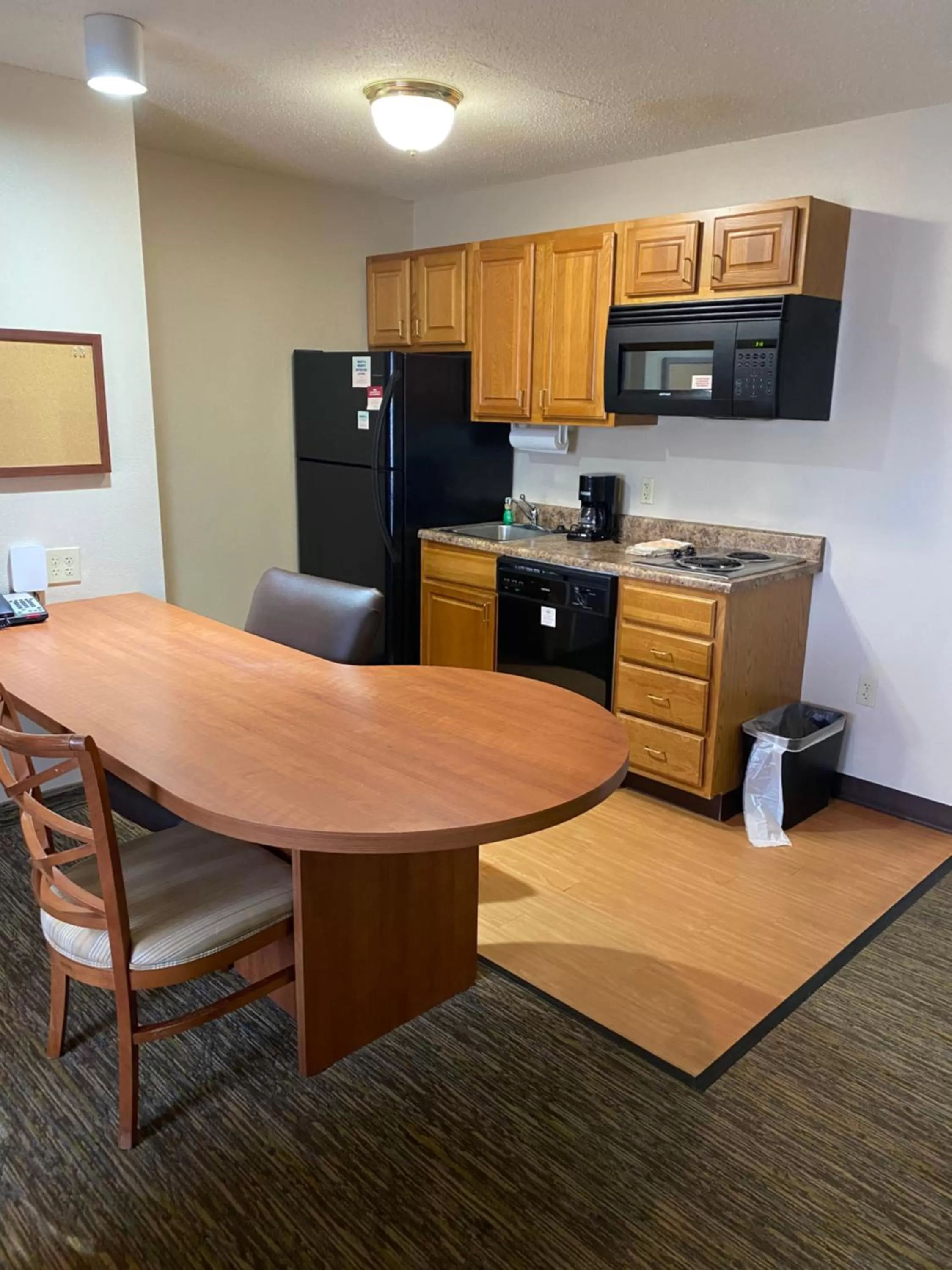 kitchen in Candlewood Williamsport by IHG