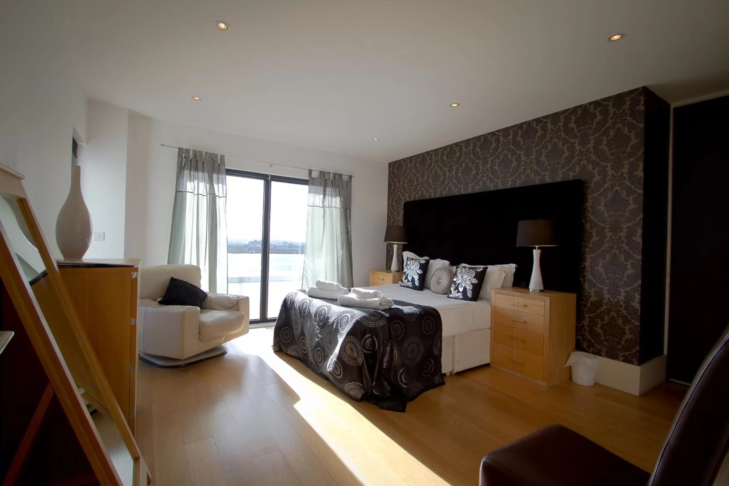 Bed in Merchant Quarters Apartments