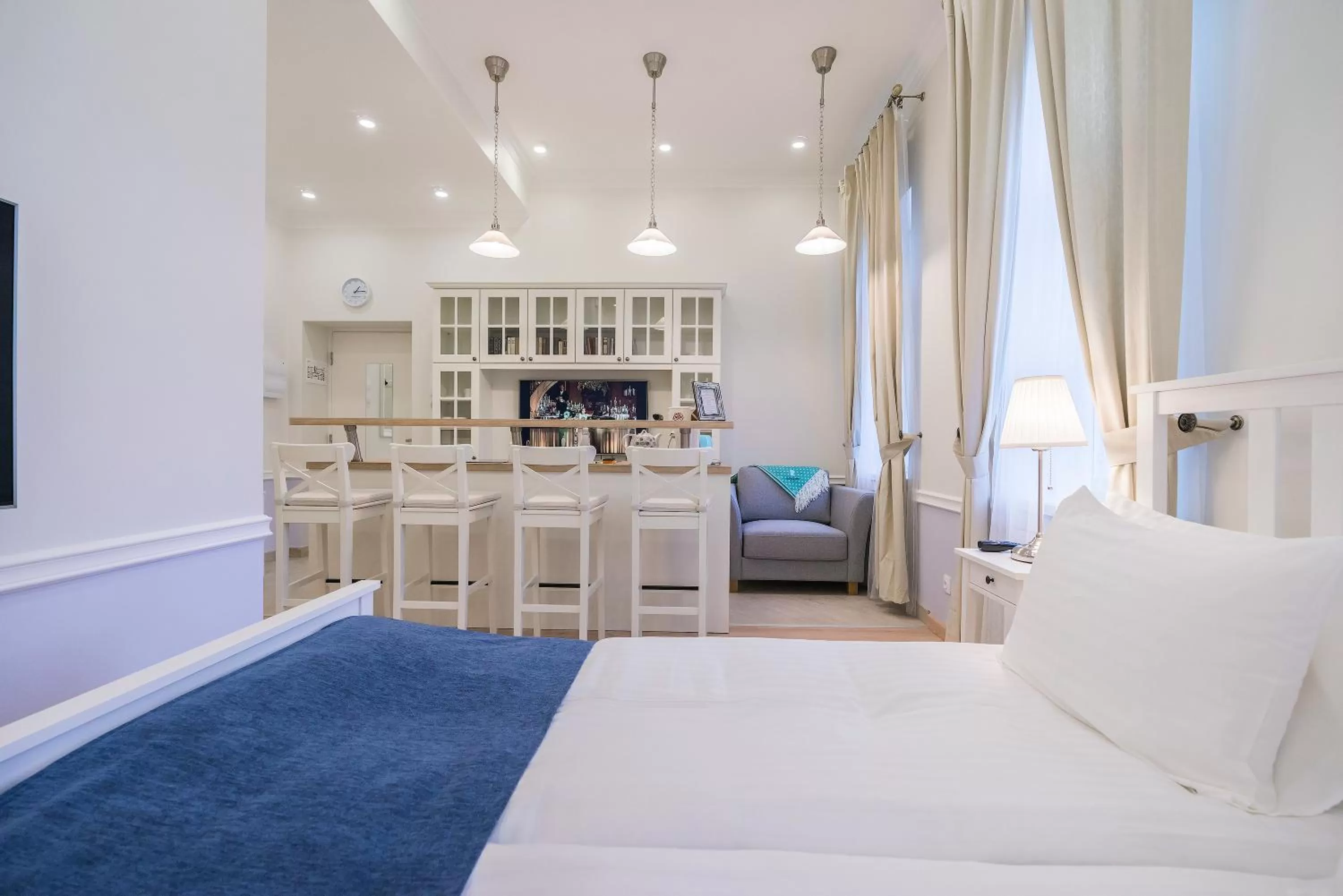 Seating area, Bed in Revelton Suites Tallinn