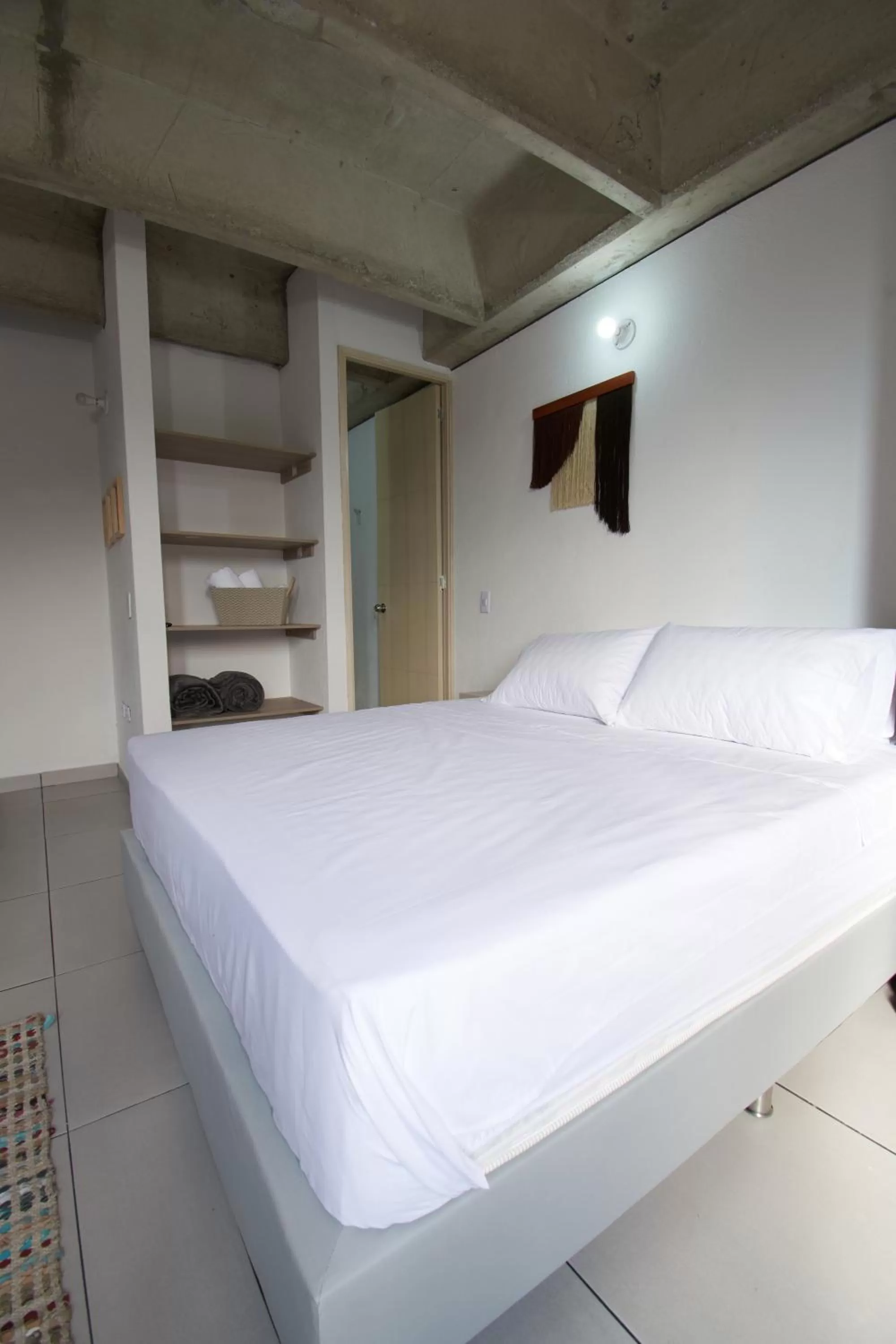 Bed in Mangata Living by Bernalo Hotels