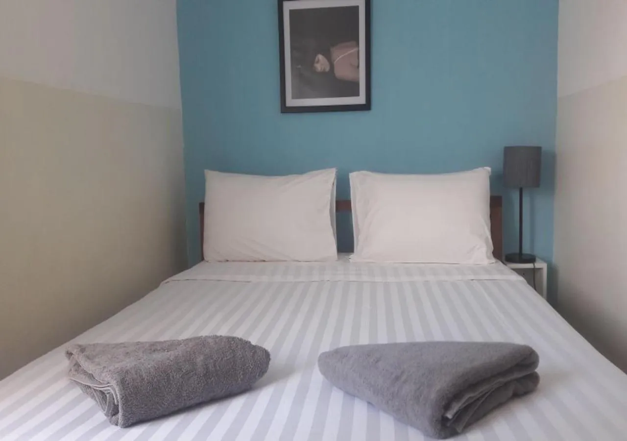 Bed in Prantara Heritage Suites