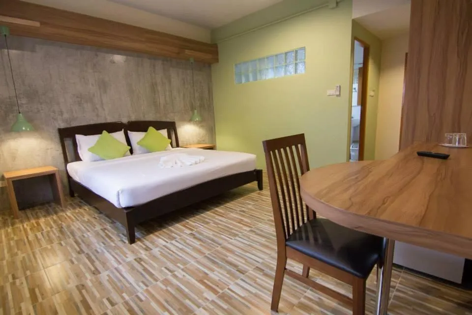 Bed in K.L. Boutique Hotel