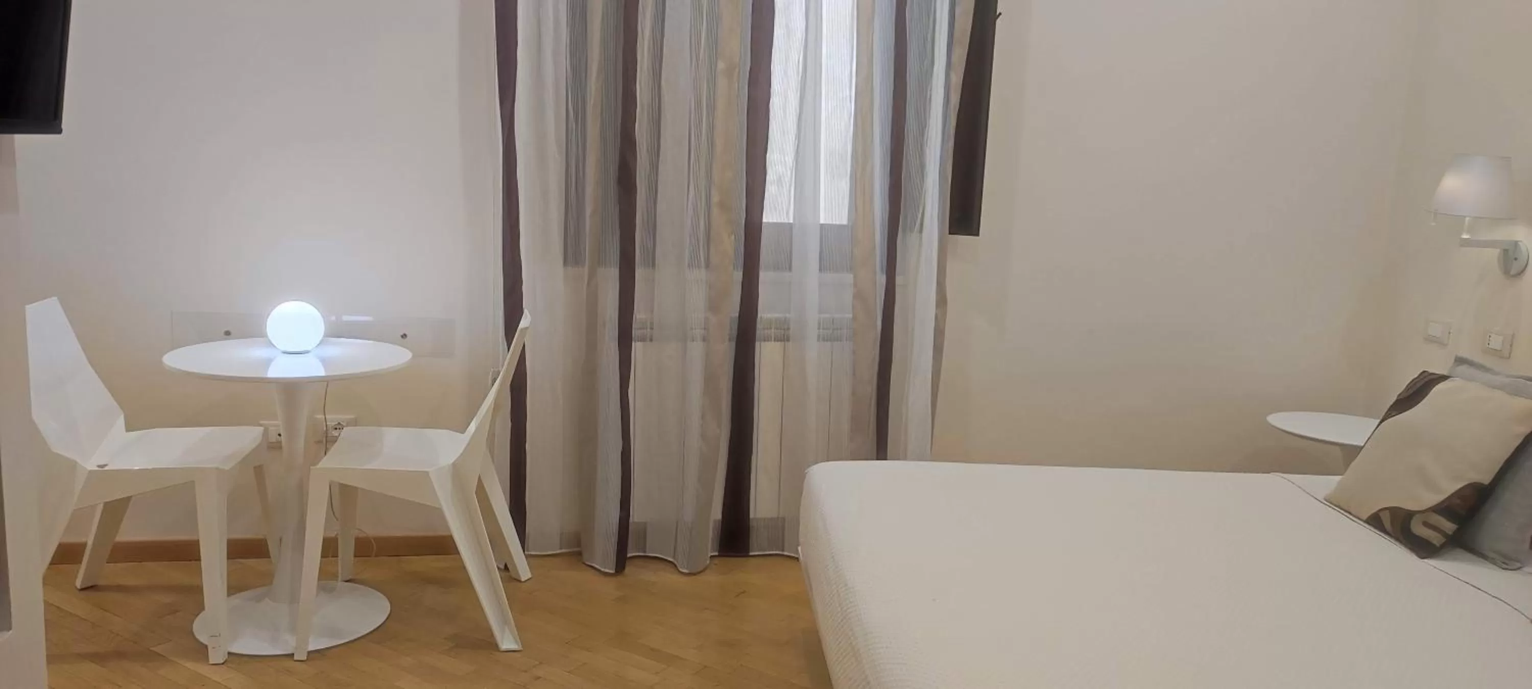 Seating area, Bed in Stella CasaBono