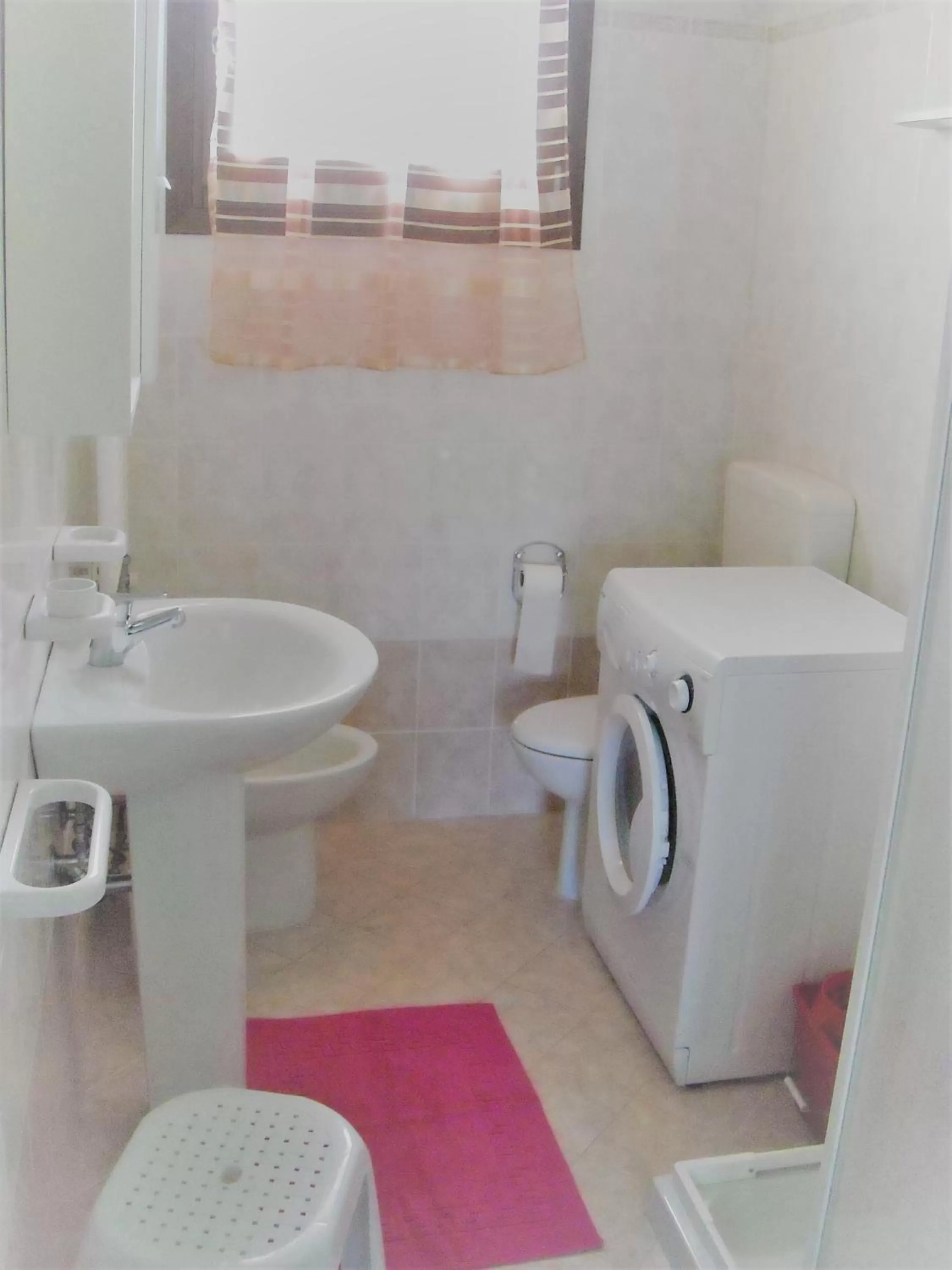 Bathroom in Villaggio dei Fiori Apart- Hotel 3 Stars - Family Resort