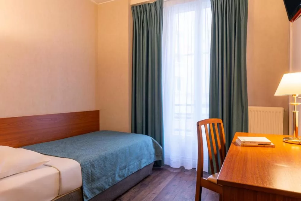 Bed in Central Hotel Paris