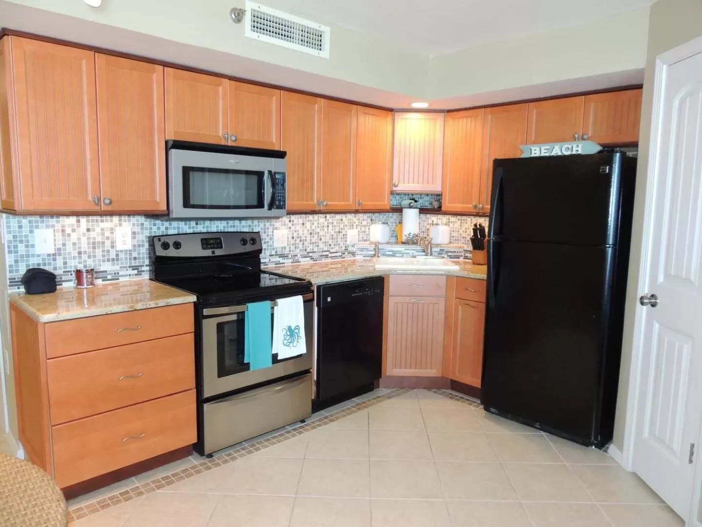 Kitchen or kitchenette in Beach Vacation Condos