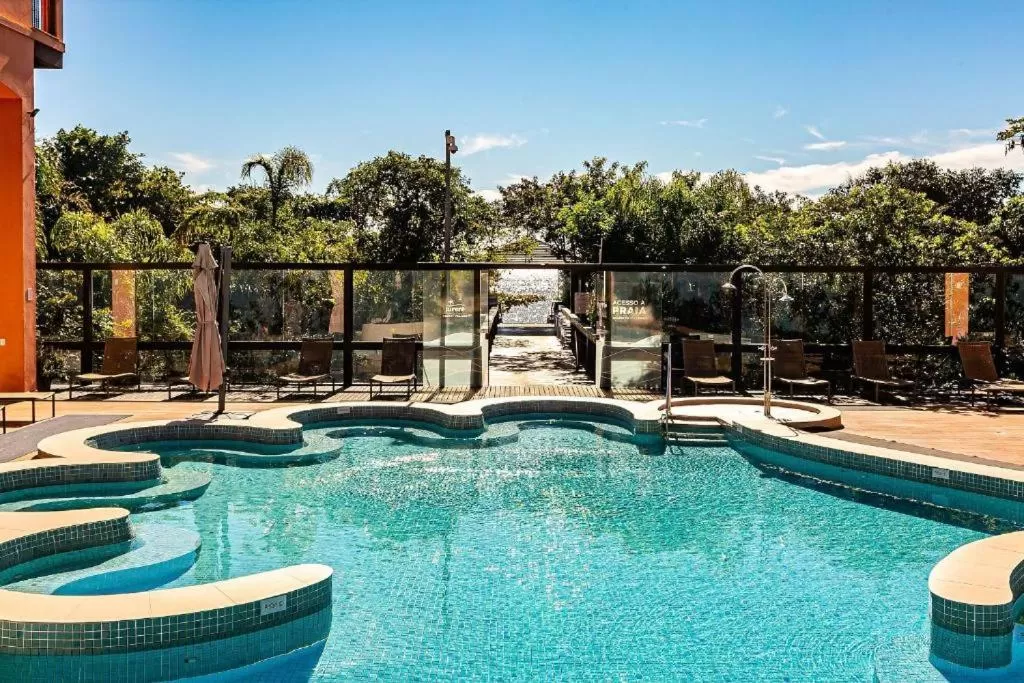 Swimming pool in Jurerê Beach Village - Studio Vista Mar