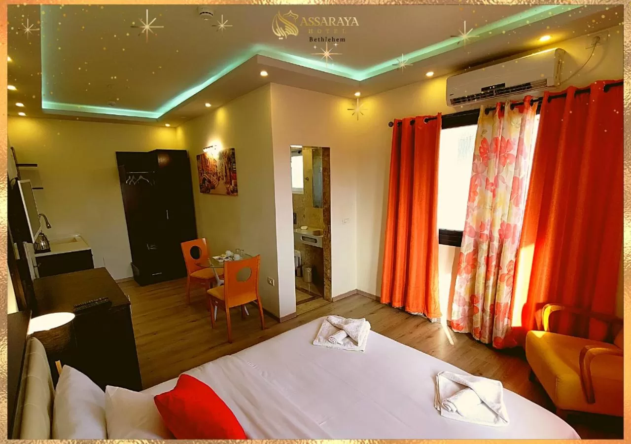 Bed in Assaraya Palace Hotel