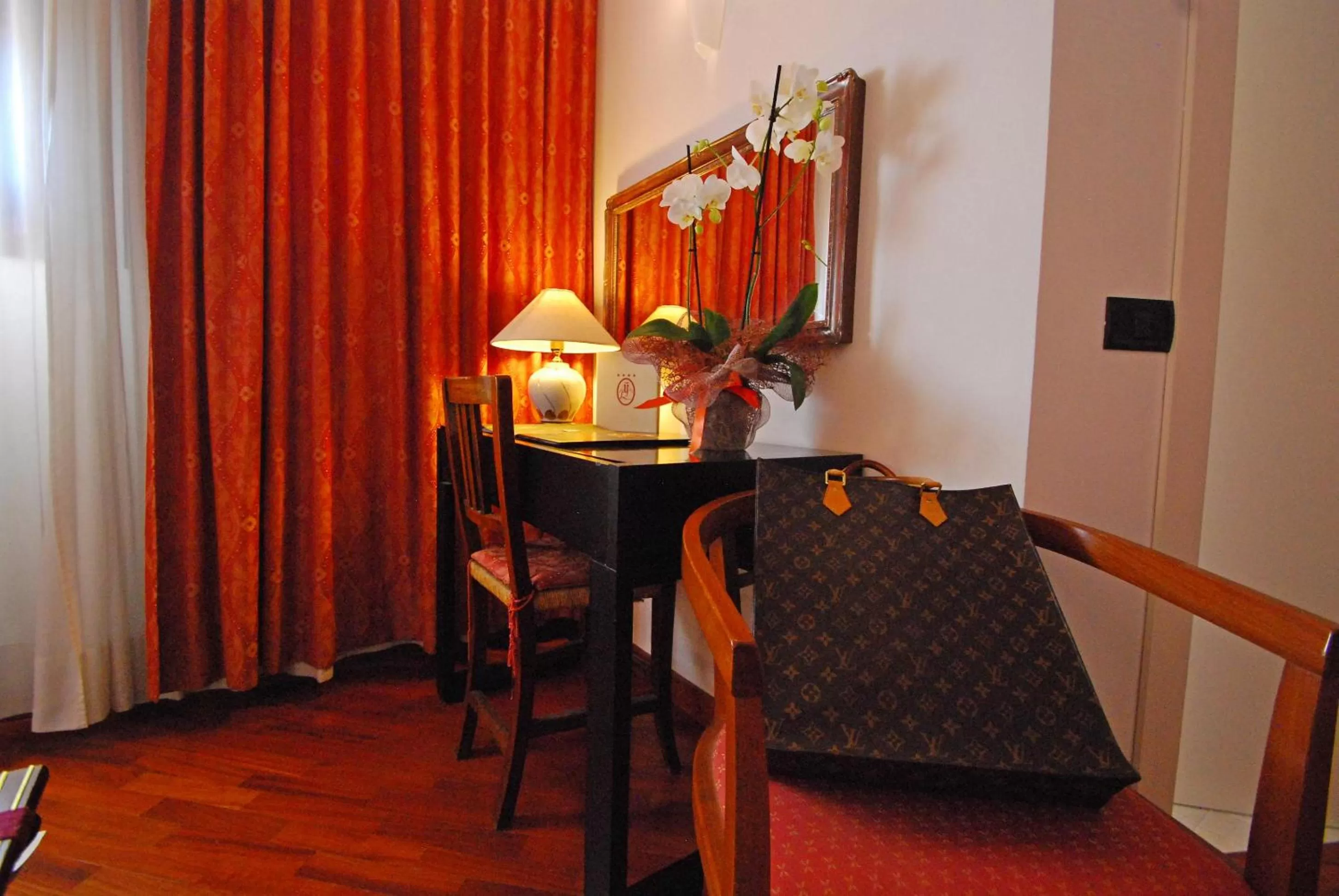 Seating area in Alla Rocca Hotel Conference & Restaurant