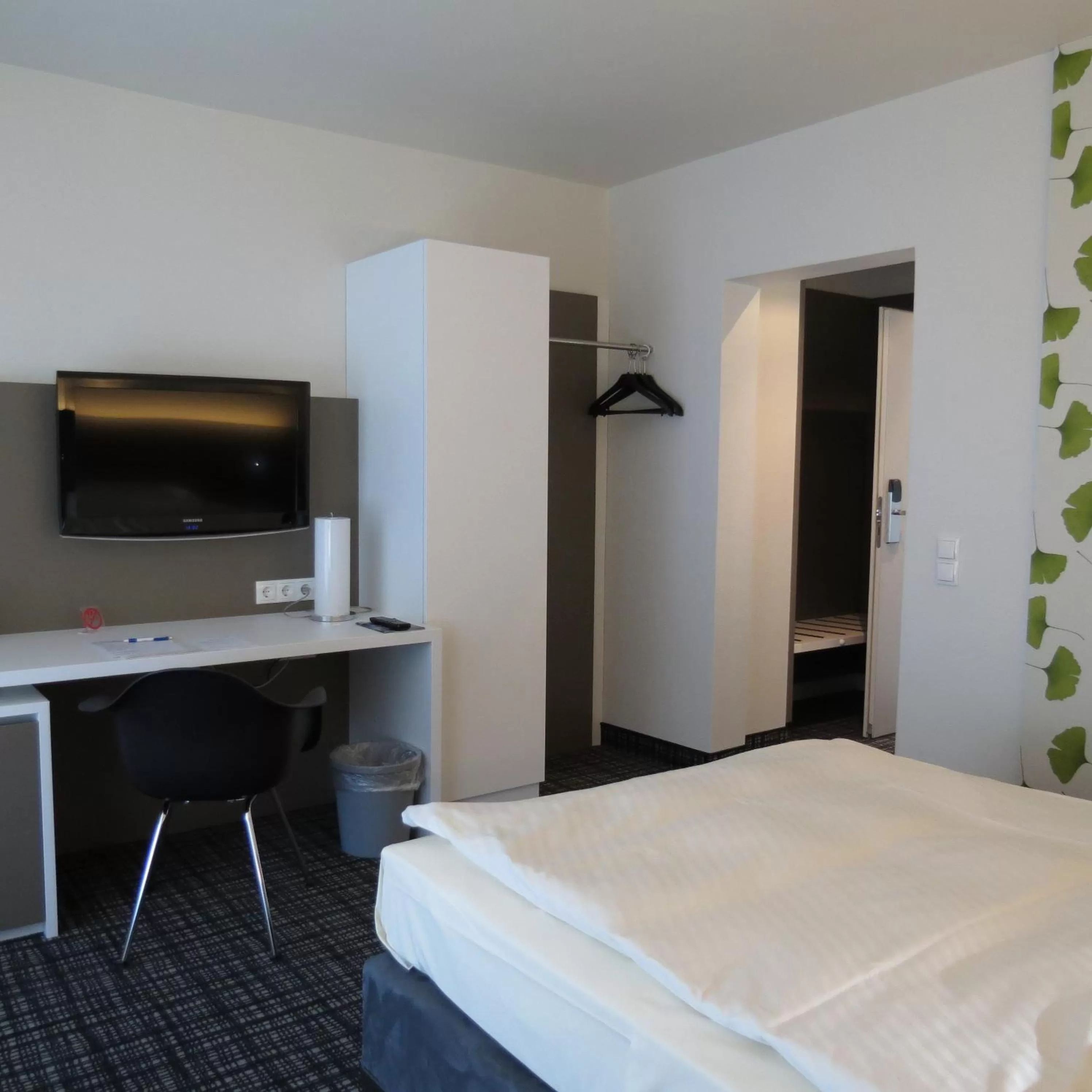 Photo of the whole room, Bed in Comfor Hotel Ulm City