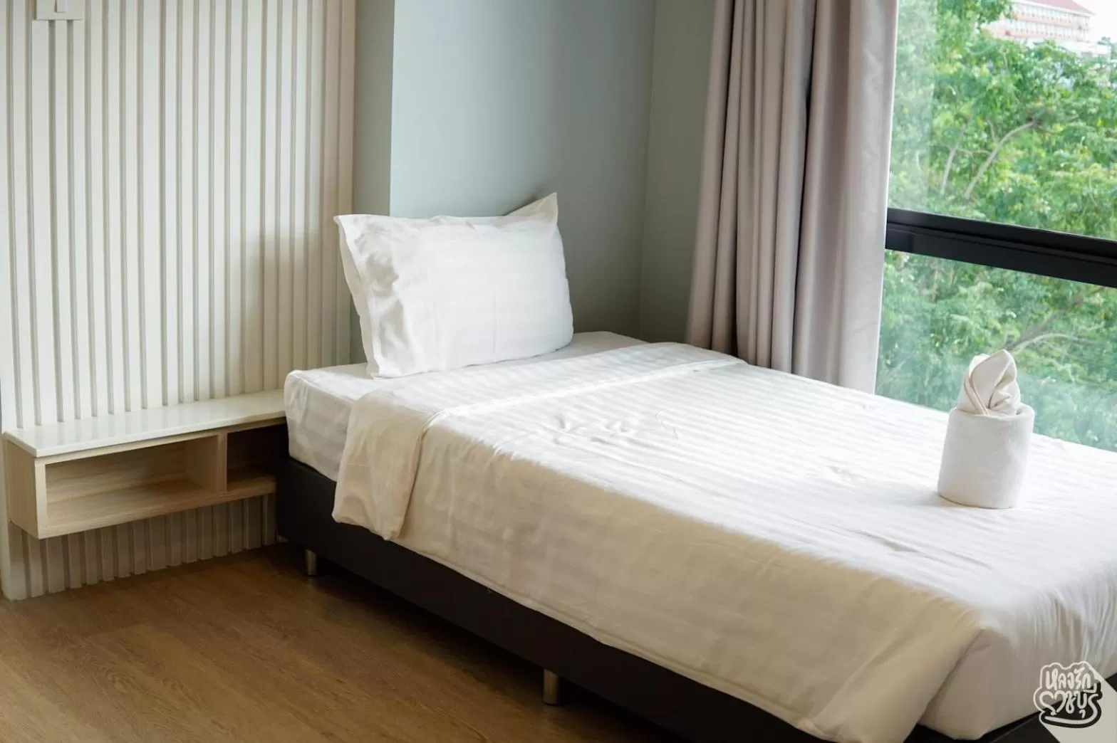 Bed in Napa Hotel Ratchaburi