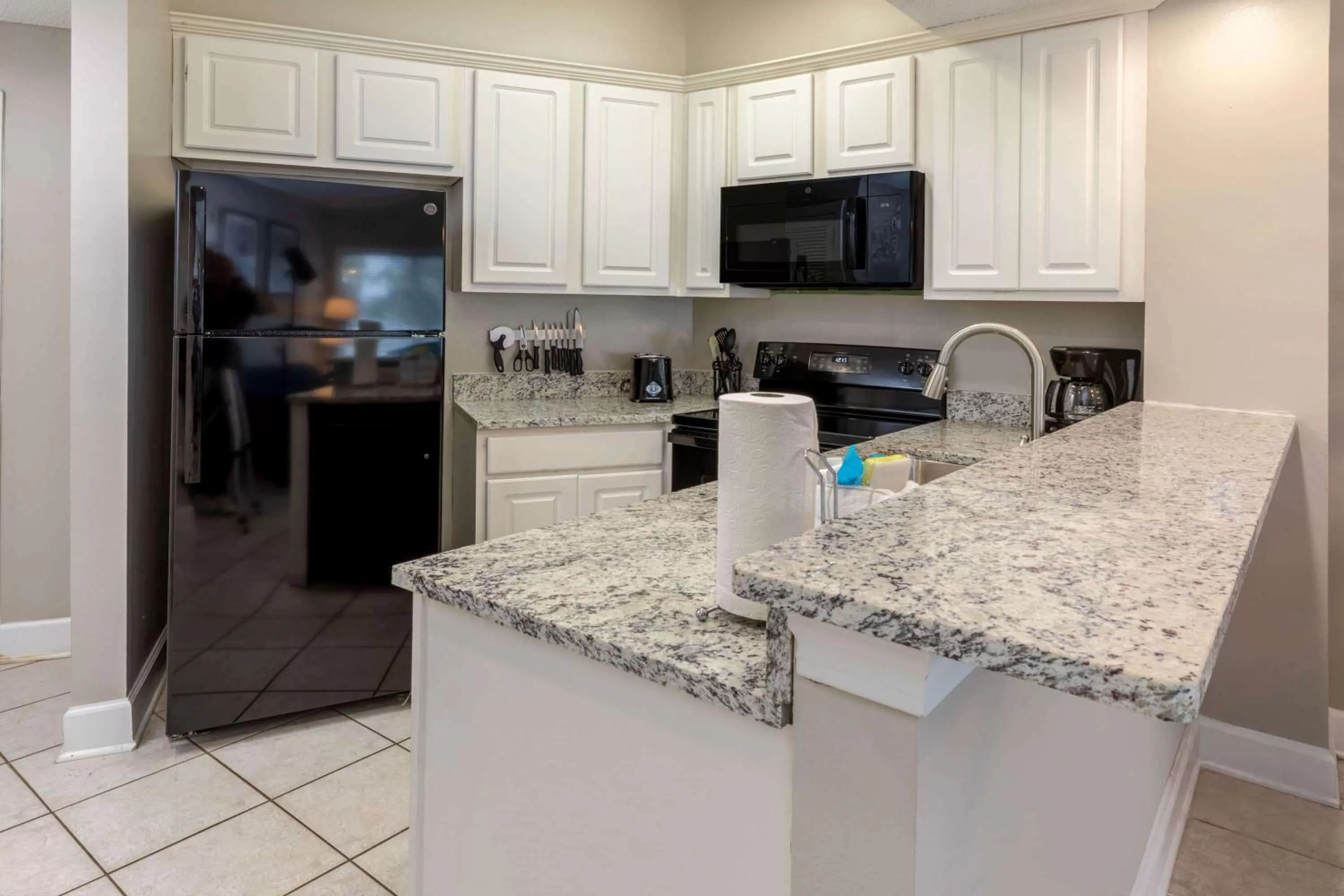 Kitchen or kitchenette in Palm Beach Resort Orange Beach a Ramada by Wyndham