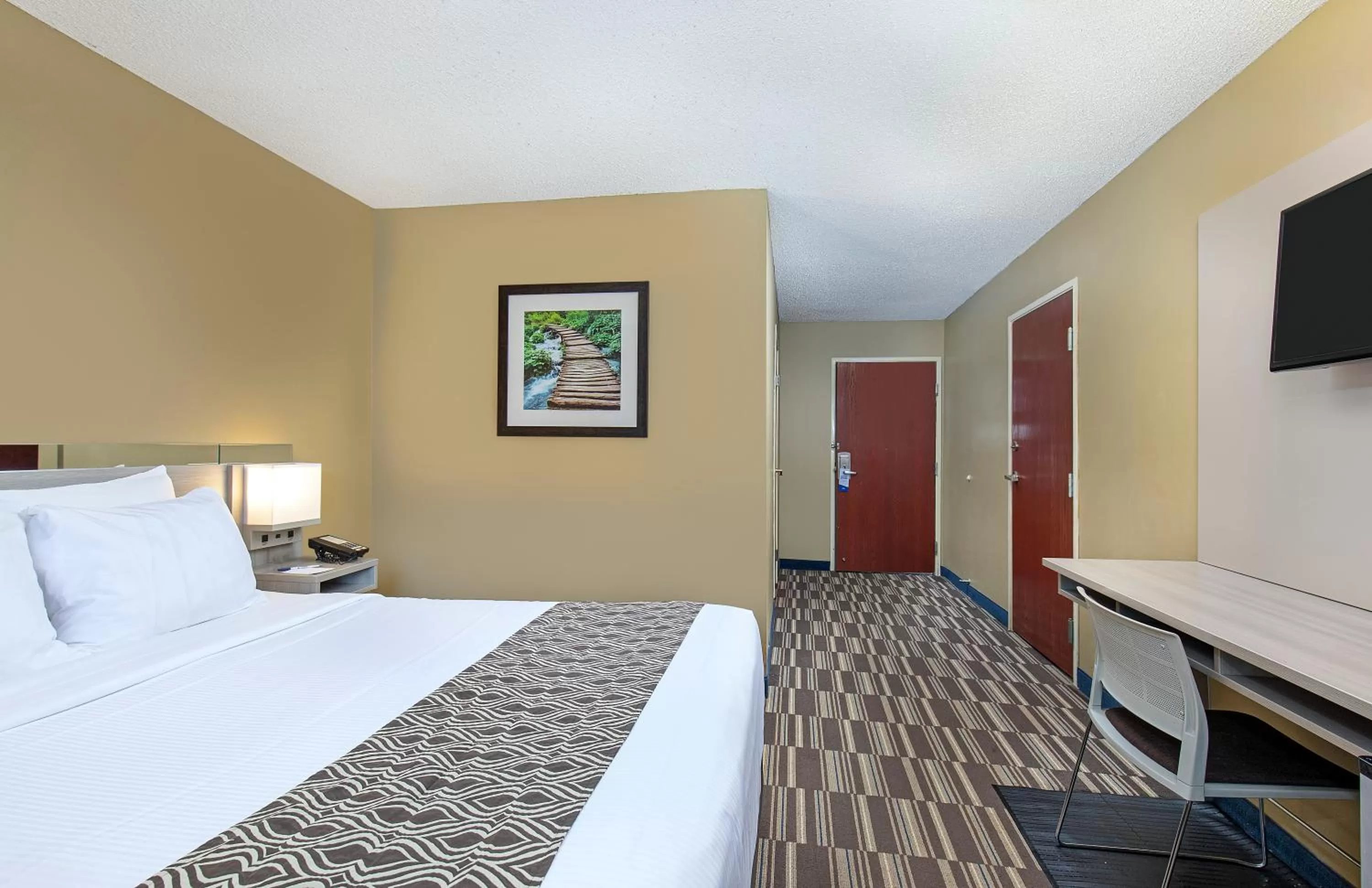 Bed in Microtel Inn & Suites by Wyndham Dry Ridge