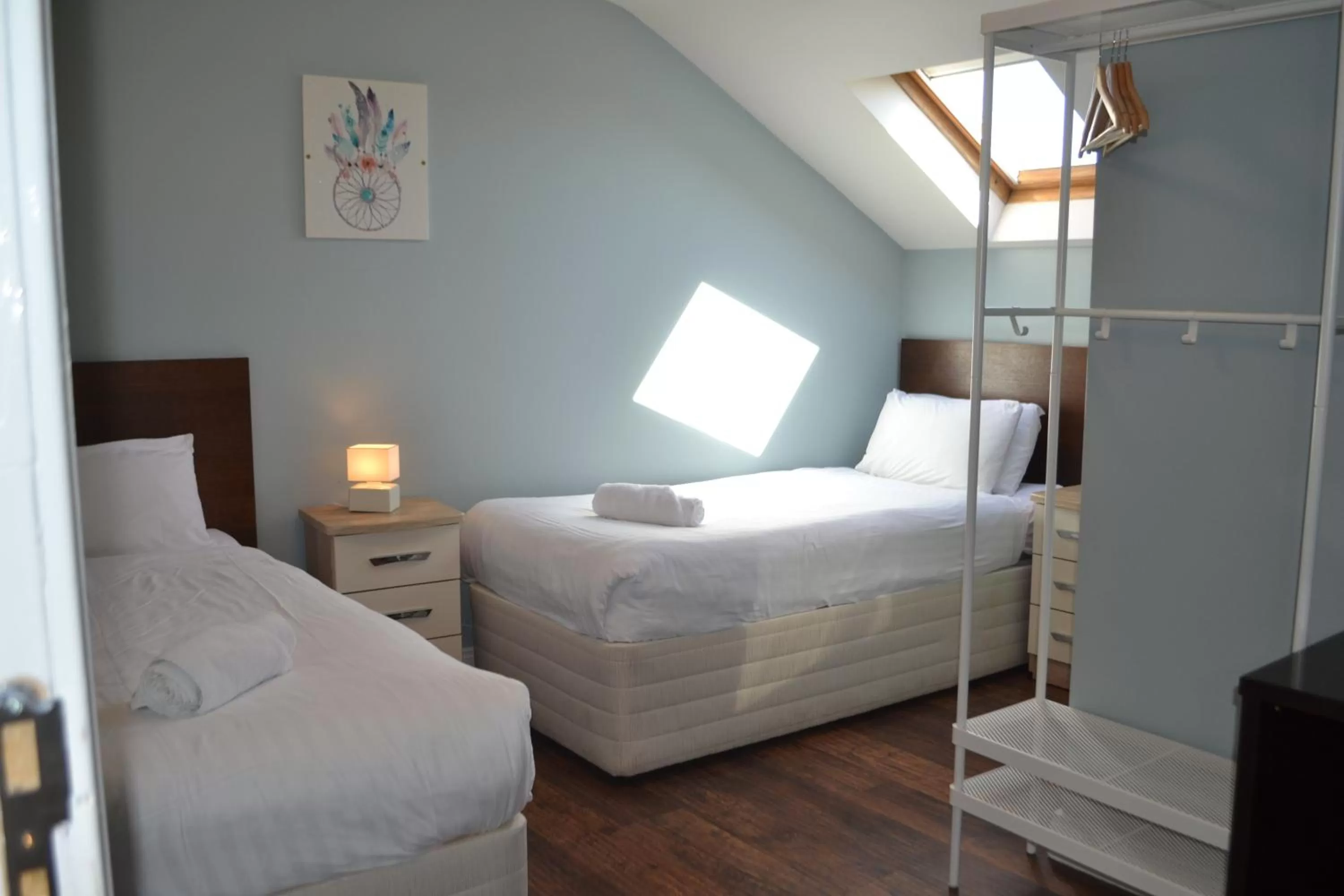 Bed in Walsh's Hotel and Apartments