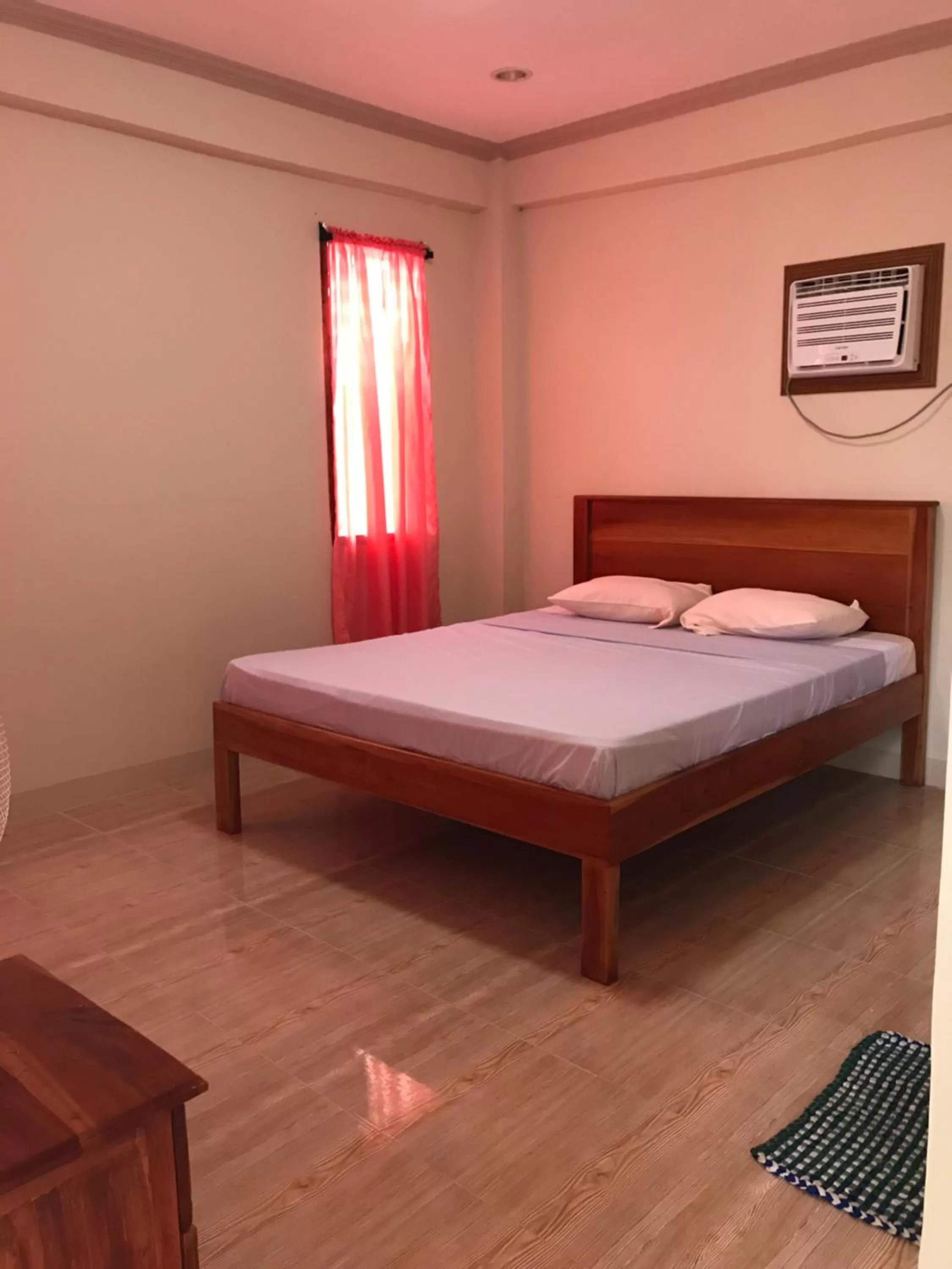 Bed in D's Oceanview Beach Resort