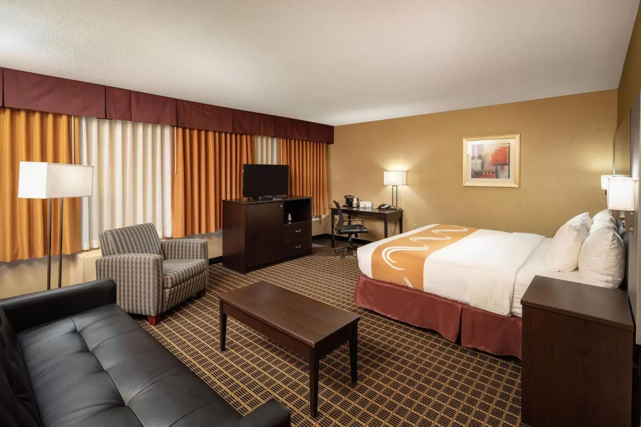 Deluxe King Suite with a joining living room & sofa bed in Quality Inn & Suites Windsor - Downtown Deluxe King Suite with a joining living room & sofa bed in Quality Inn & Suites Windsor - Downtown