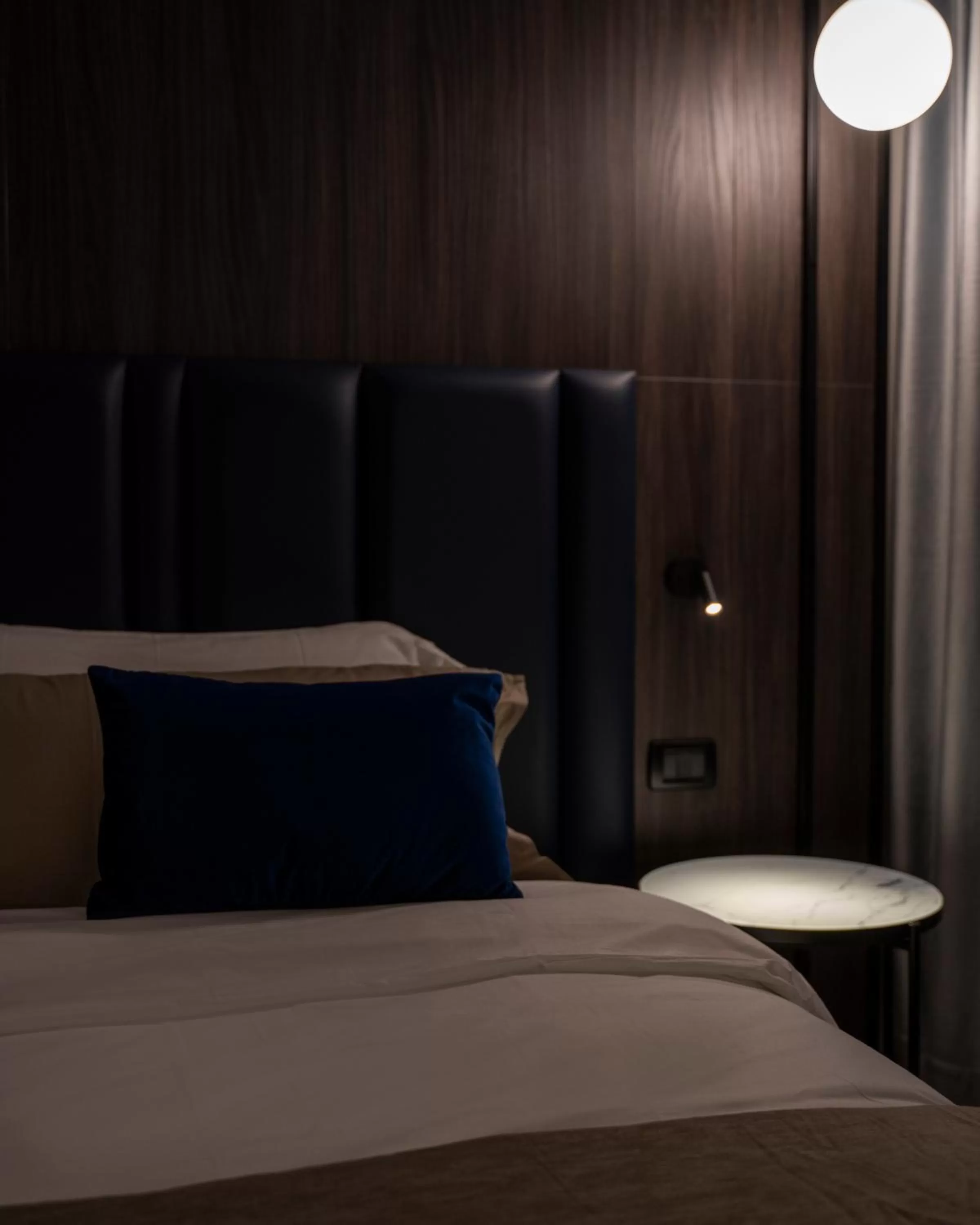 Bed in Hotel Leonessa