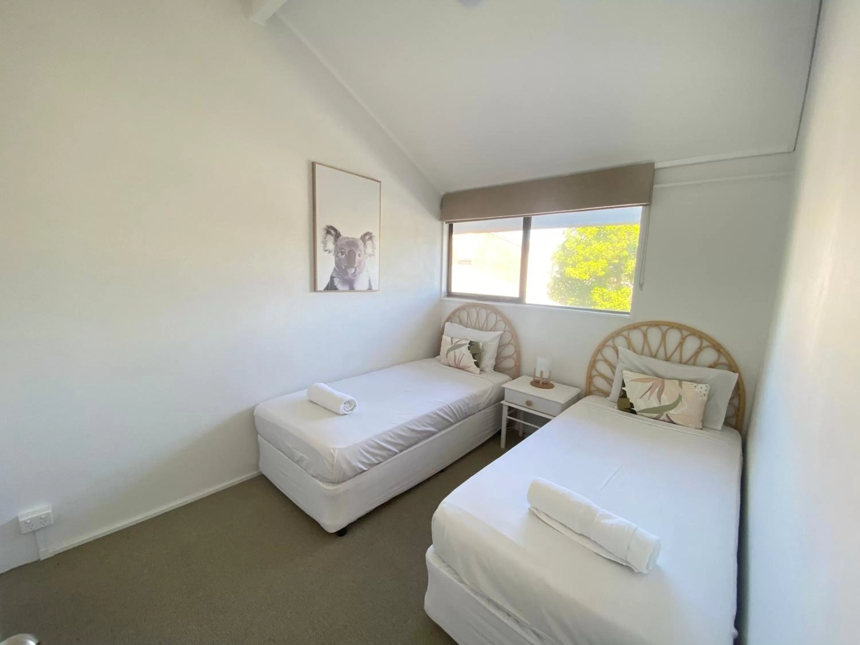 Bed in Glen Eden Beach Resort