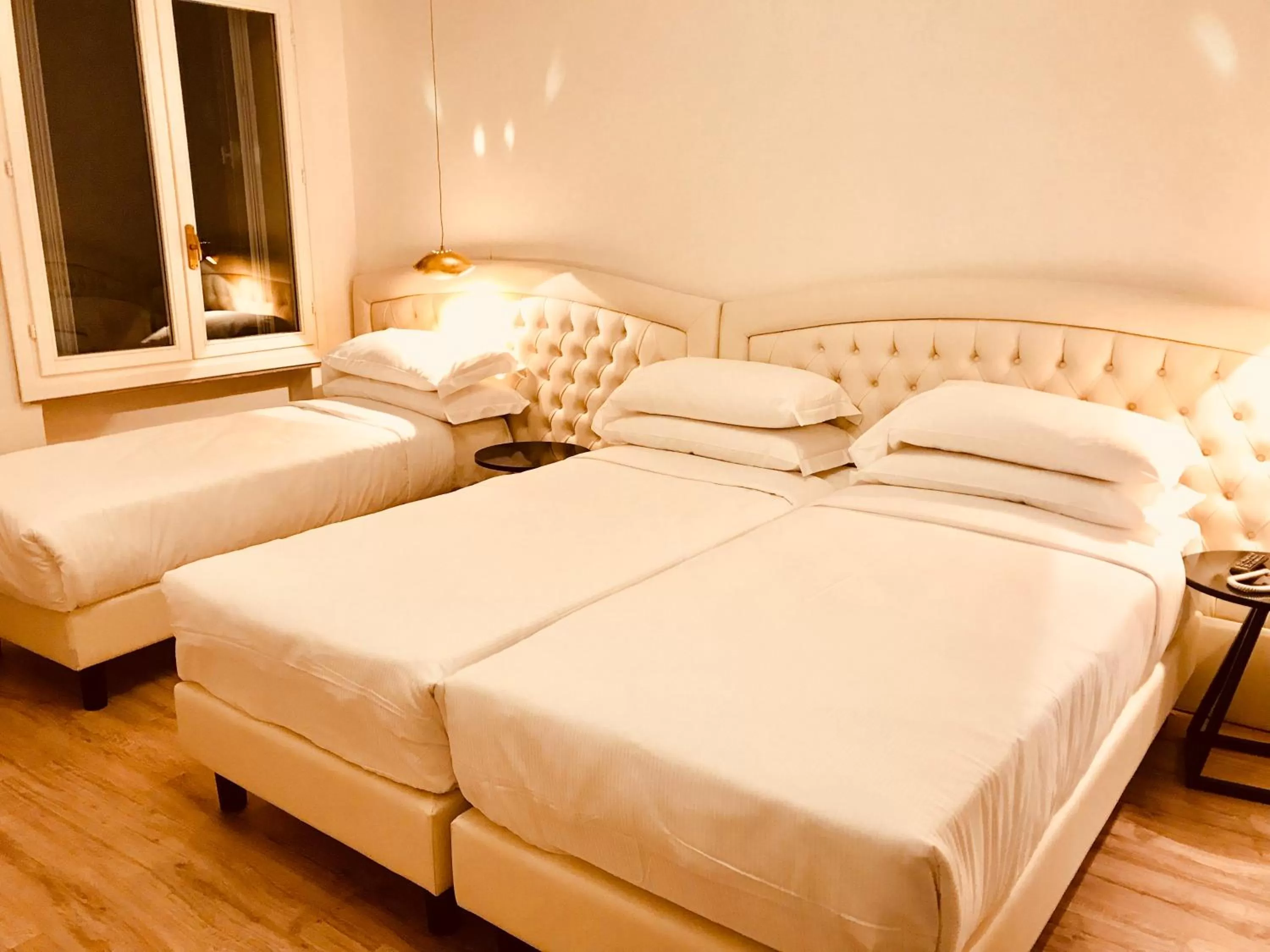 Bed in Palazzo Otello 1847 Wellness & Spa