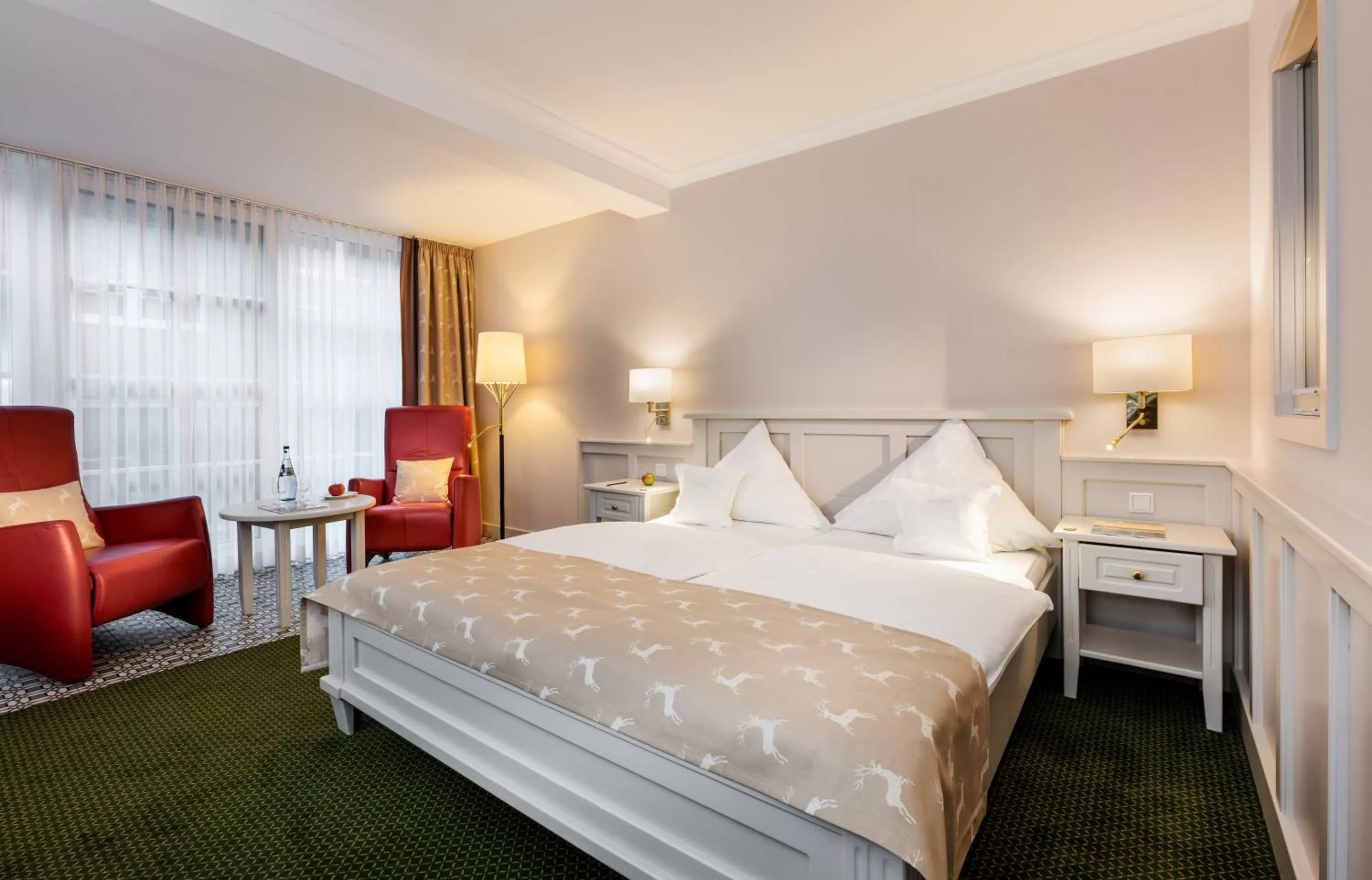 Photo of the whole room, Bed in Romantik Hotel Jagdhaus Eiden am See