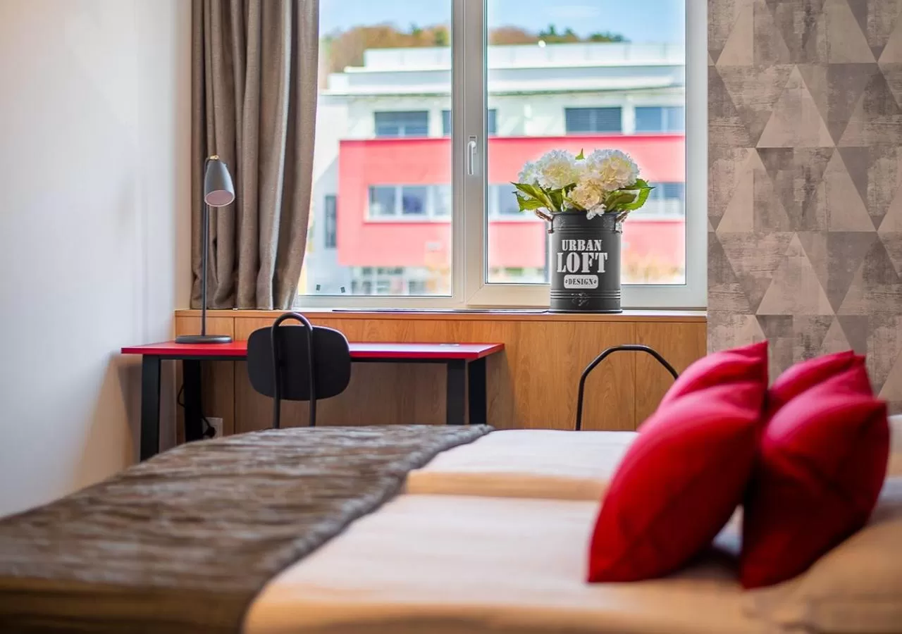 Bed in Urban Ring Hotel