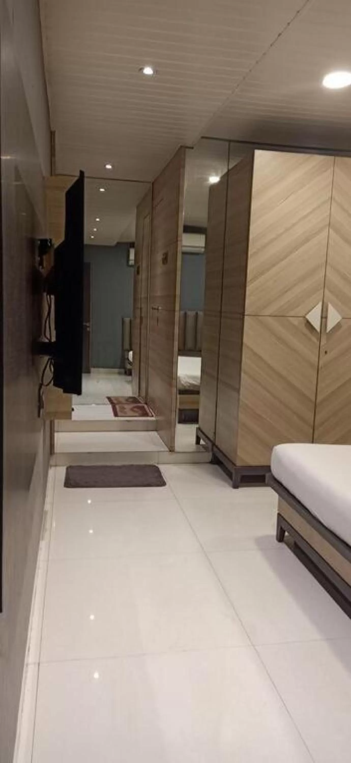 Bed in HOTEL PRATIKSHA RESIDENCY