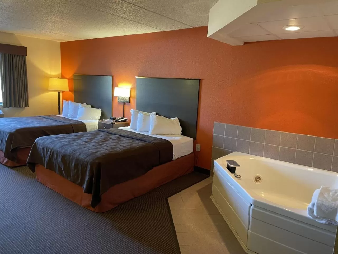 Bedroom, Bed in AmericInn by Wyndham Minocqua