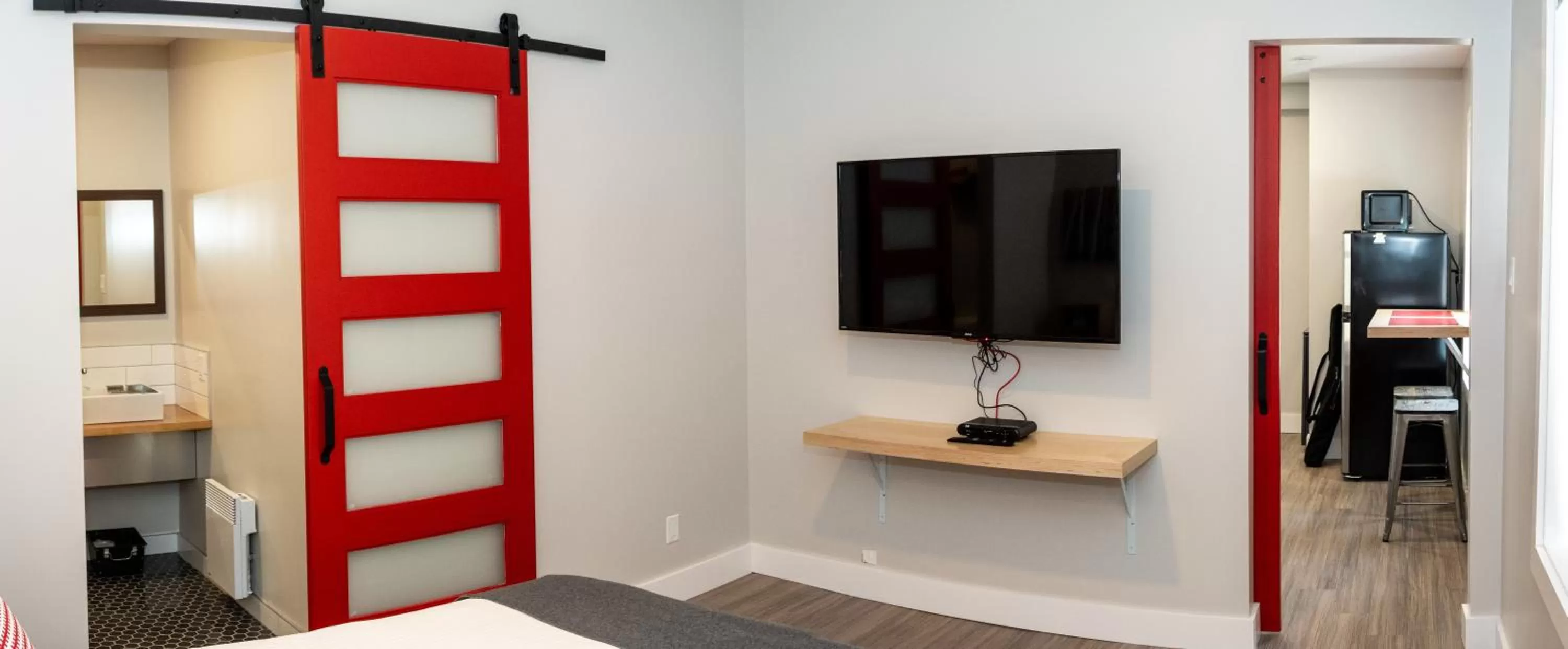 Communal lounge/ TV room, Bed in Morel Executive Suites