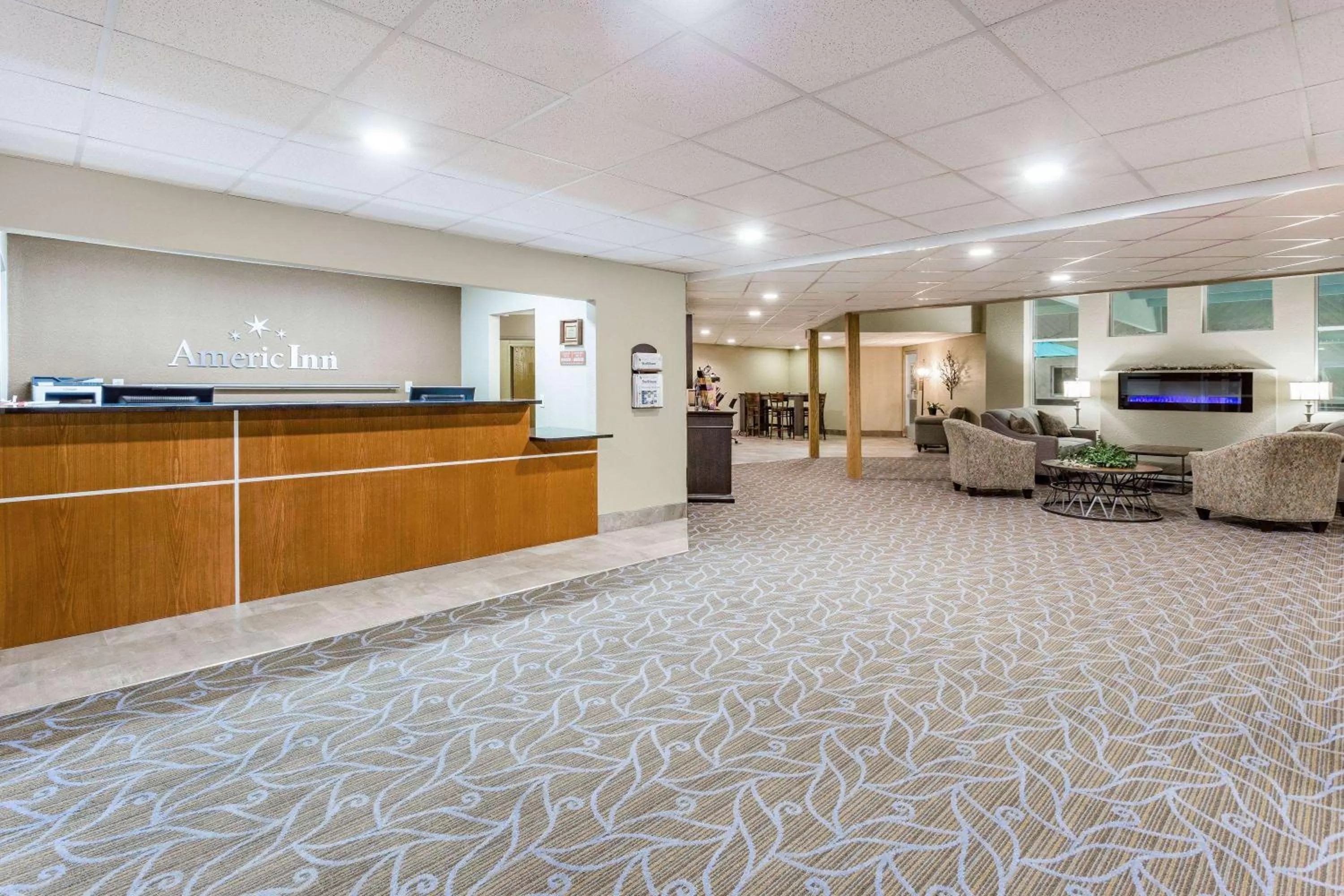 Seating area in AmericInn by Wyndham Sleepy Eye