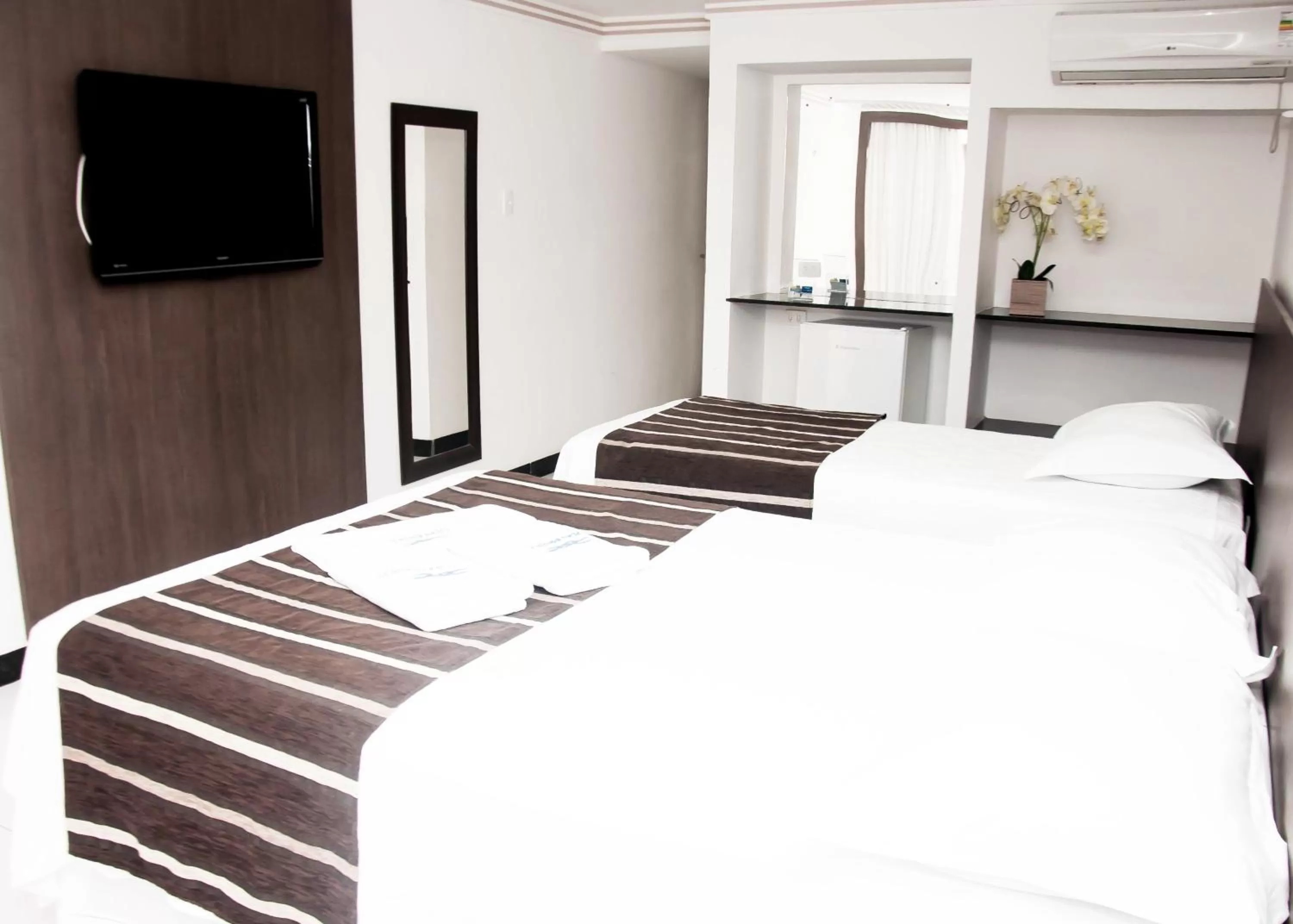 Bed, Room Photo in Tirol Praia Hotel