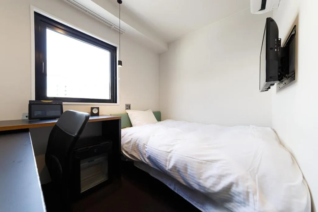 Photo of the whole room, Bed in Hotel Citio Shizuoka