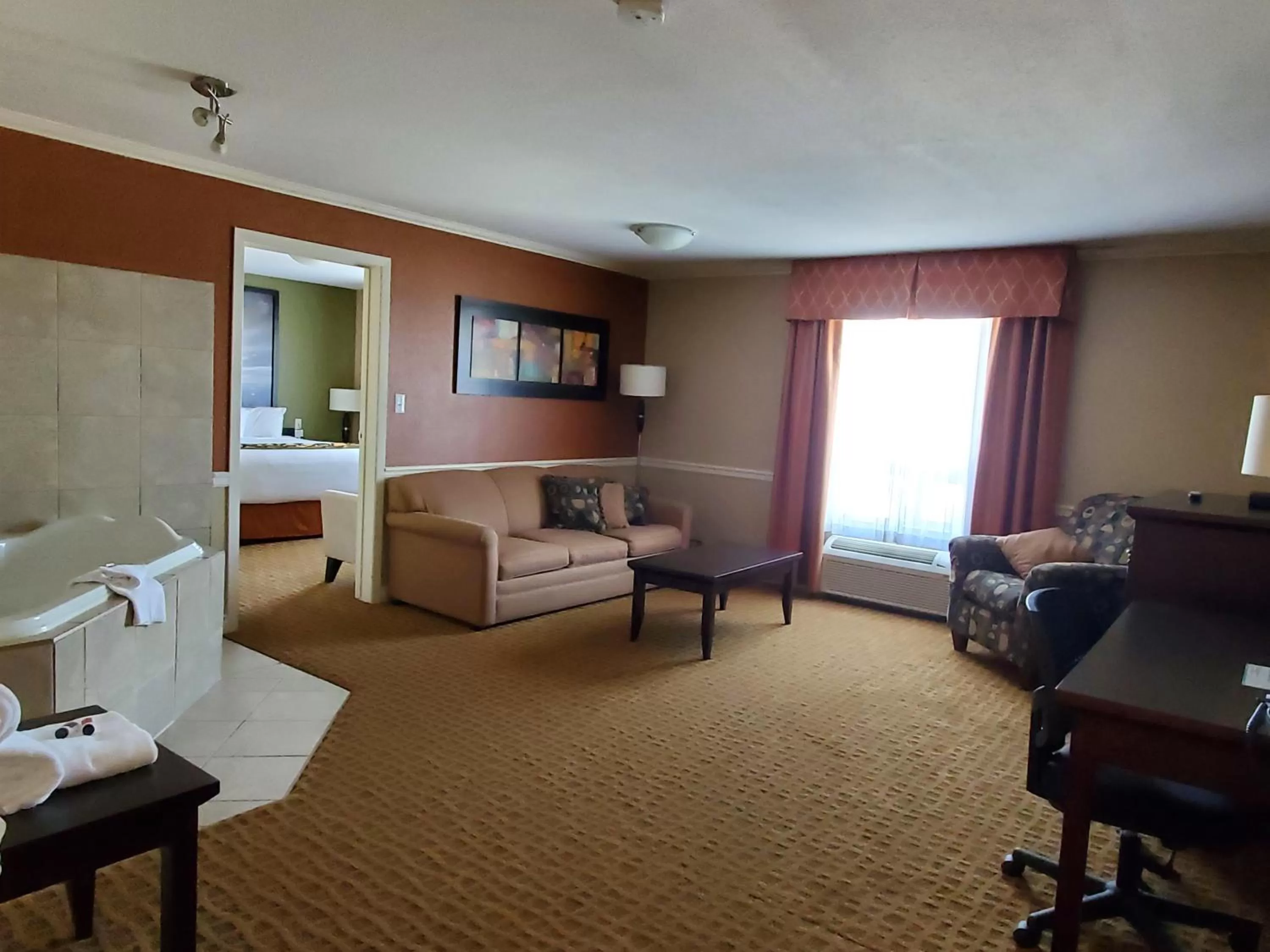 Living room in Super 8 by Wyndham Edmonton International Airport