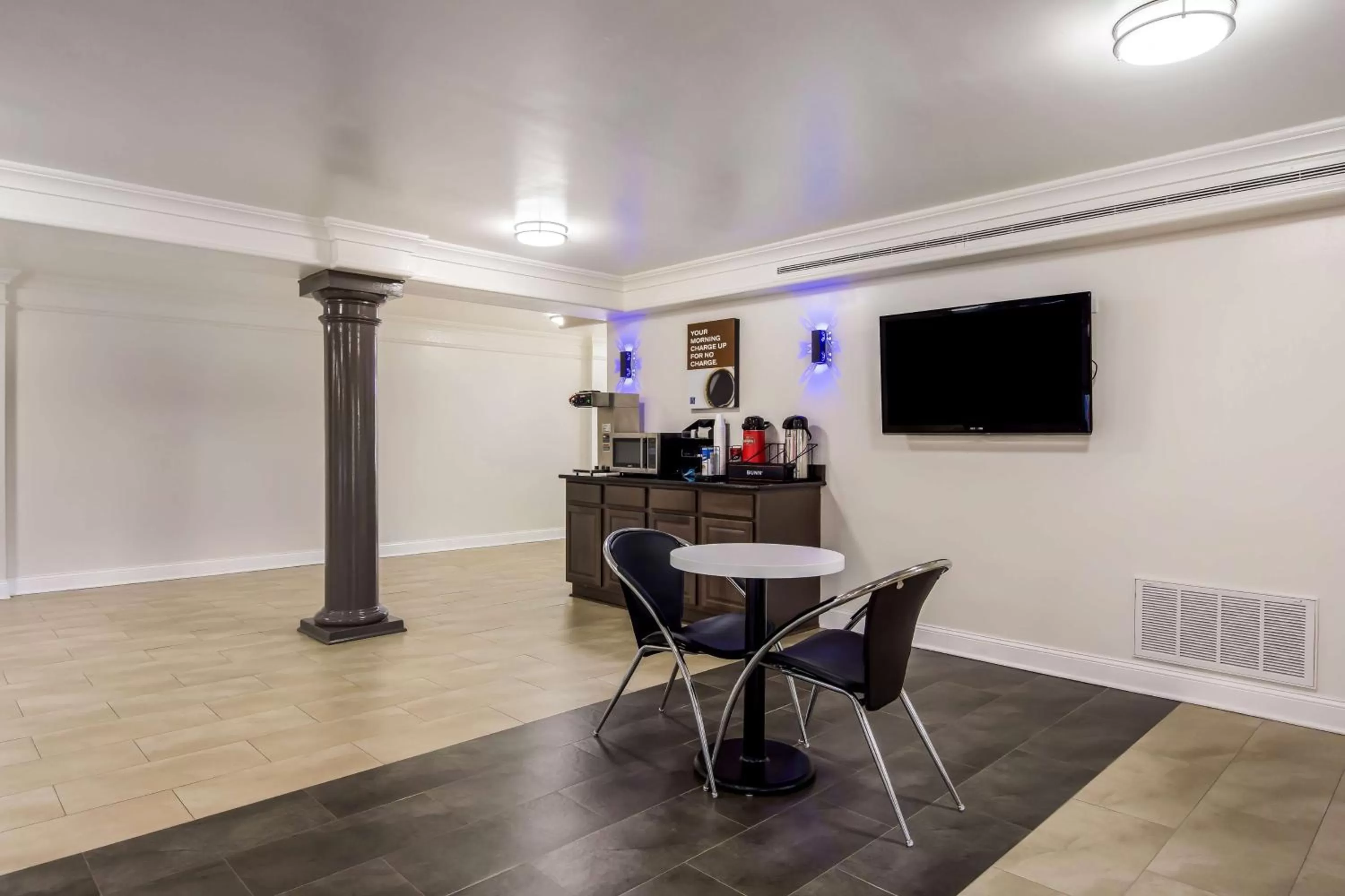 Communal lounge/ TV room in Motel 6-North Little Rock, AR - McCain