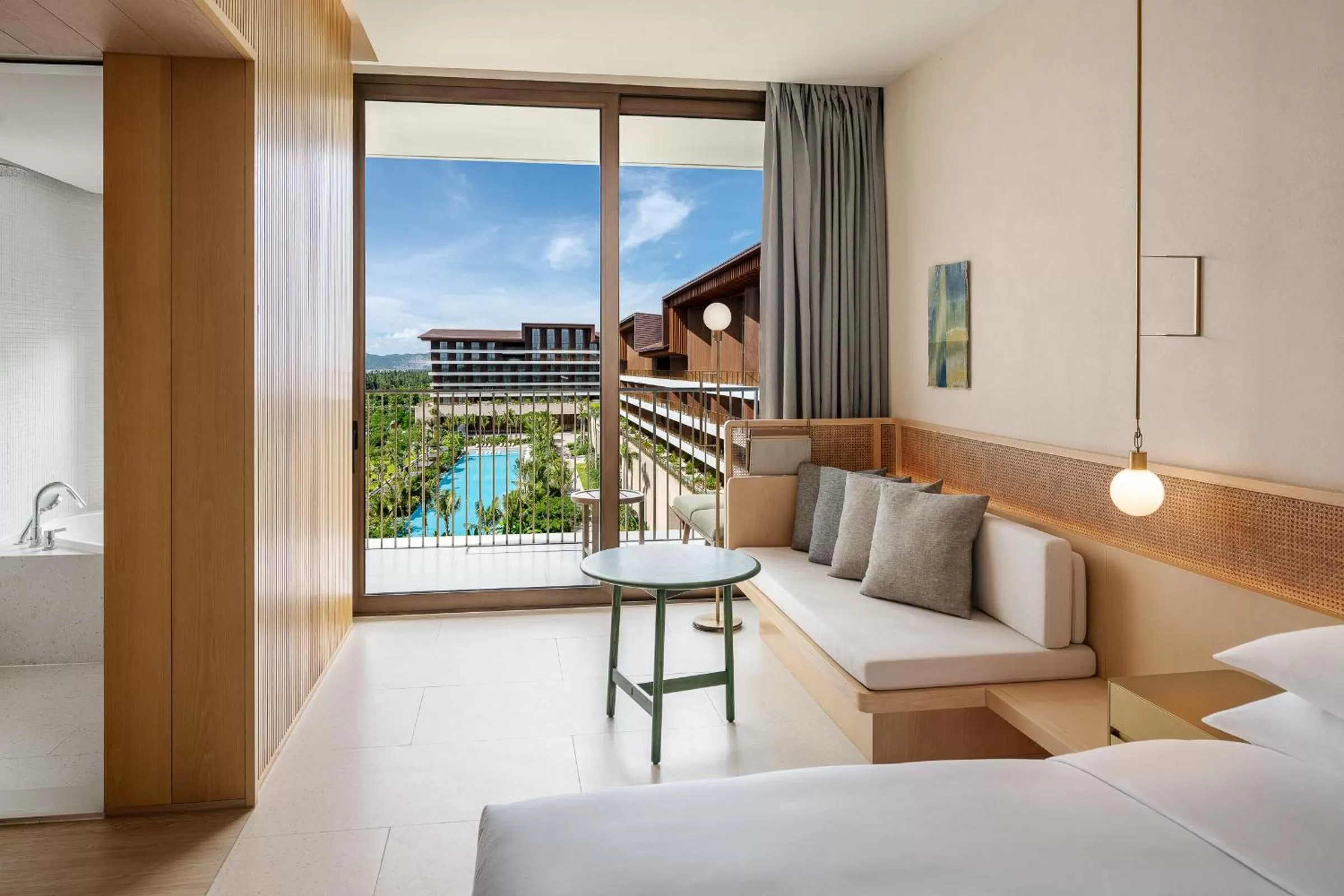 Seating area, Bed in The Taikang Sanya, a Tribute Portfolio Resort