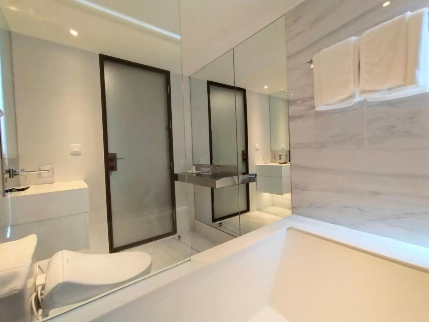 Bathroom in ashley hotel bkk