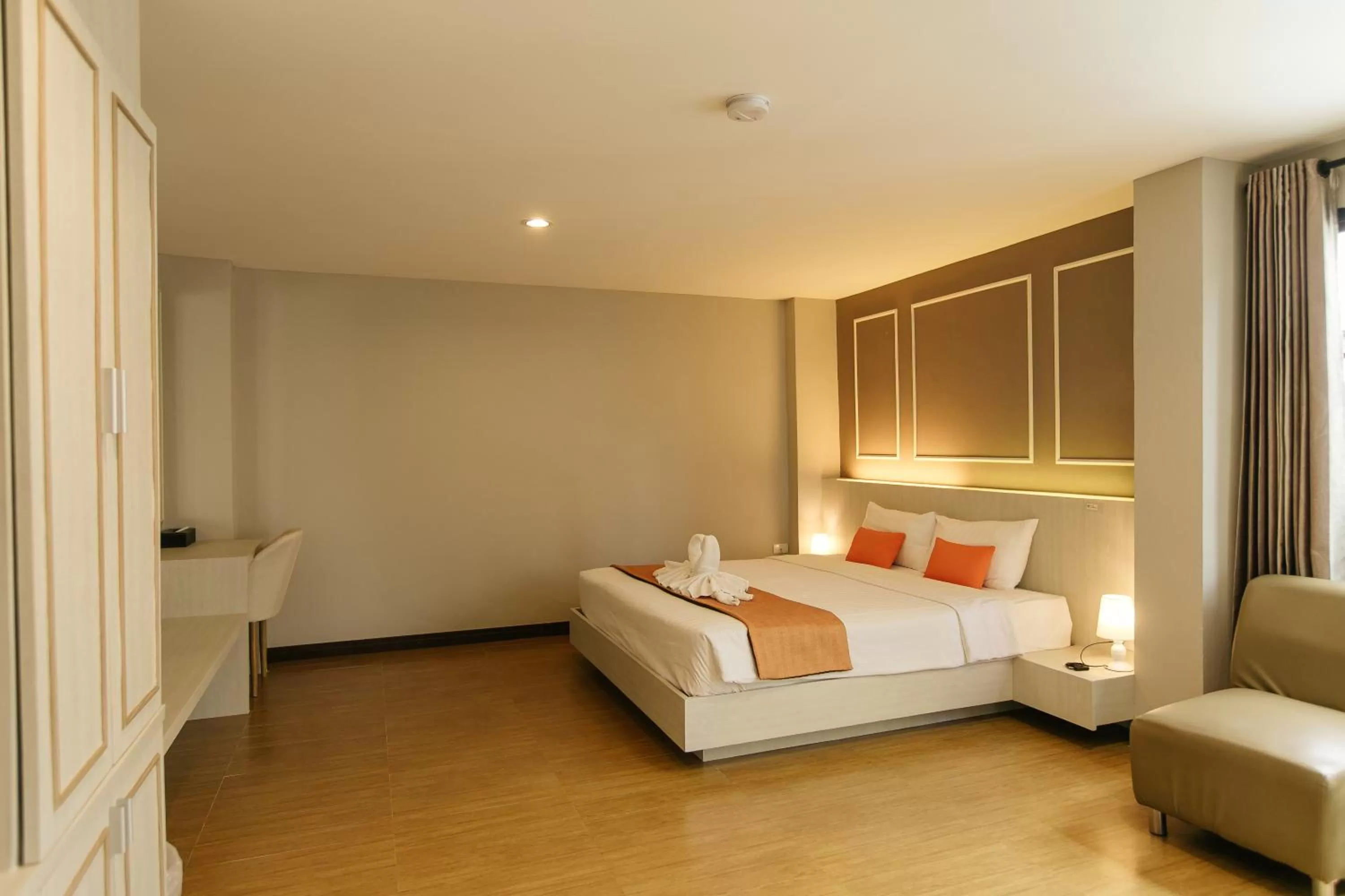 Bed in De Hug Hotel & Residence