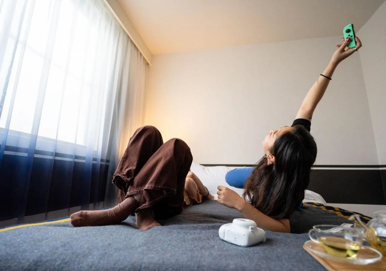 Bed in Hotel Graphy Nezu