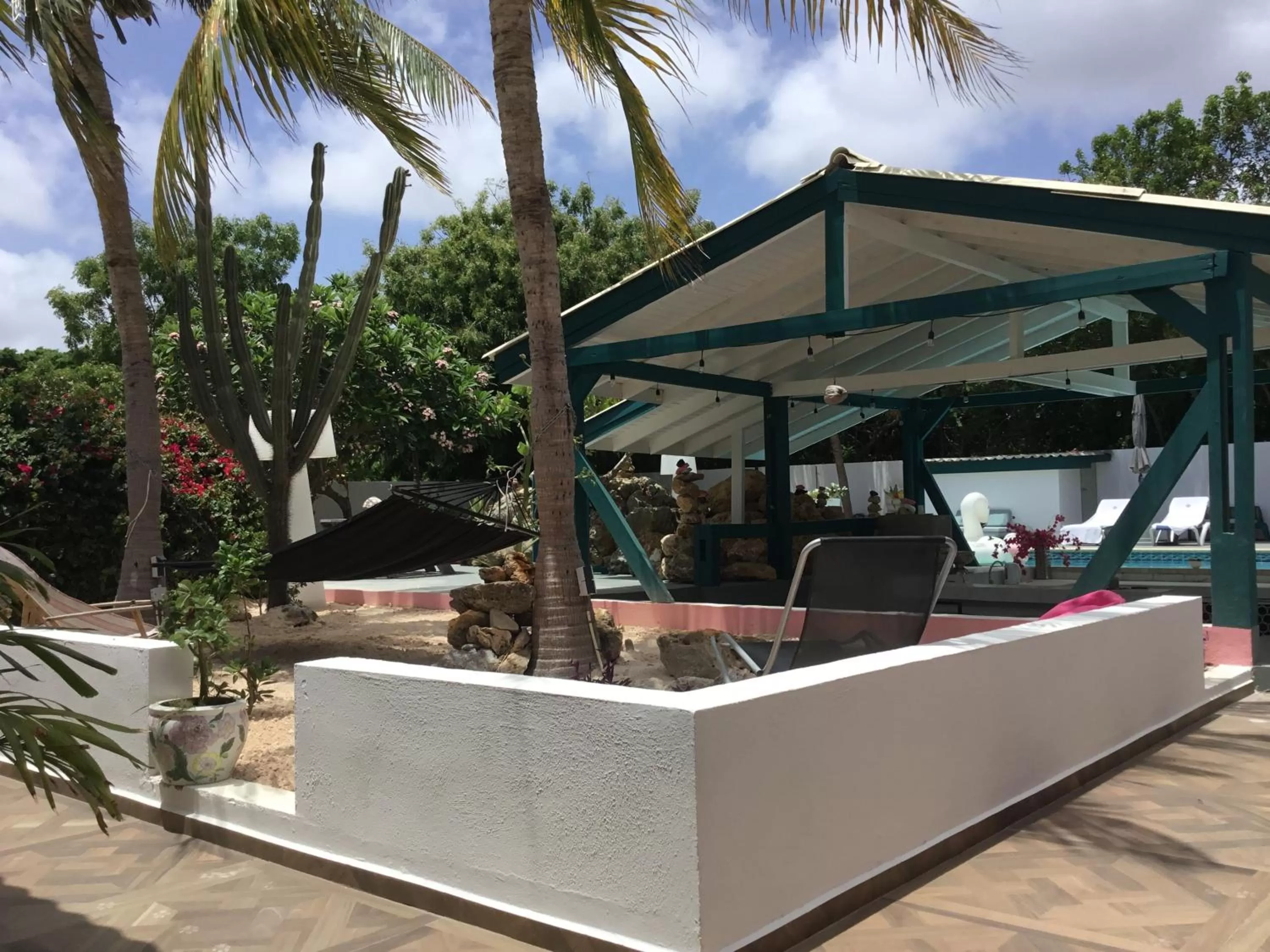 Garden view in THUISHAVEN boutique mini-resort - fantastic garden and large pool - adults only