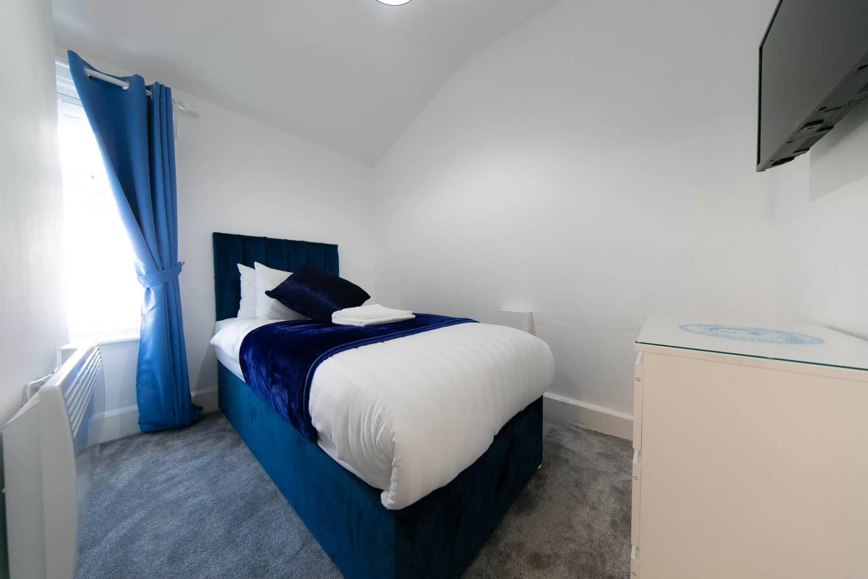 Bed in The New Apollo Hotel