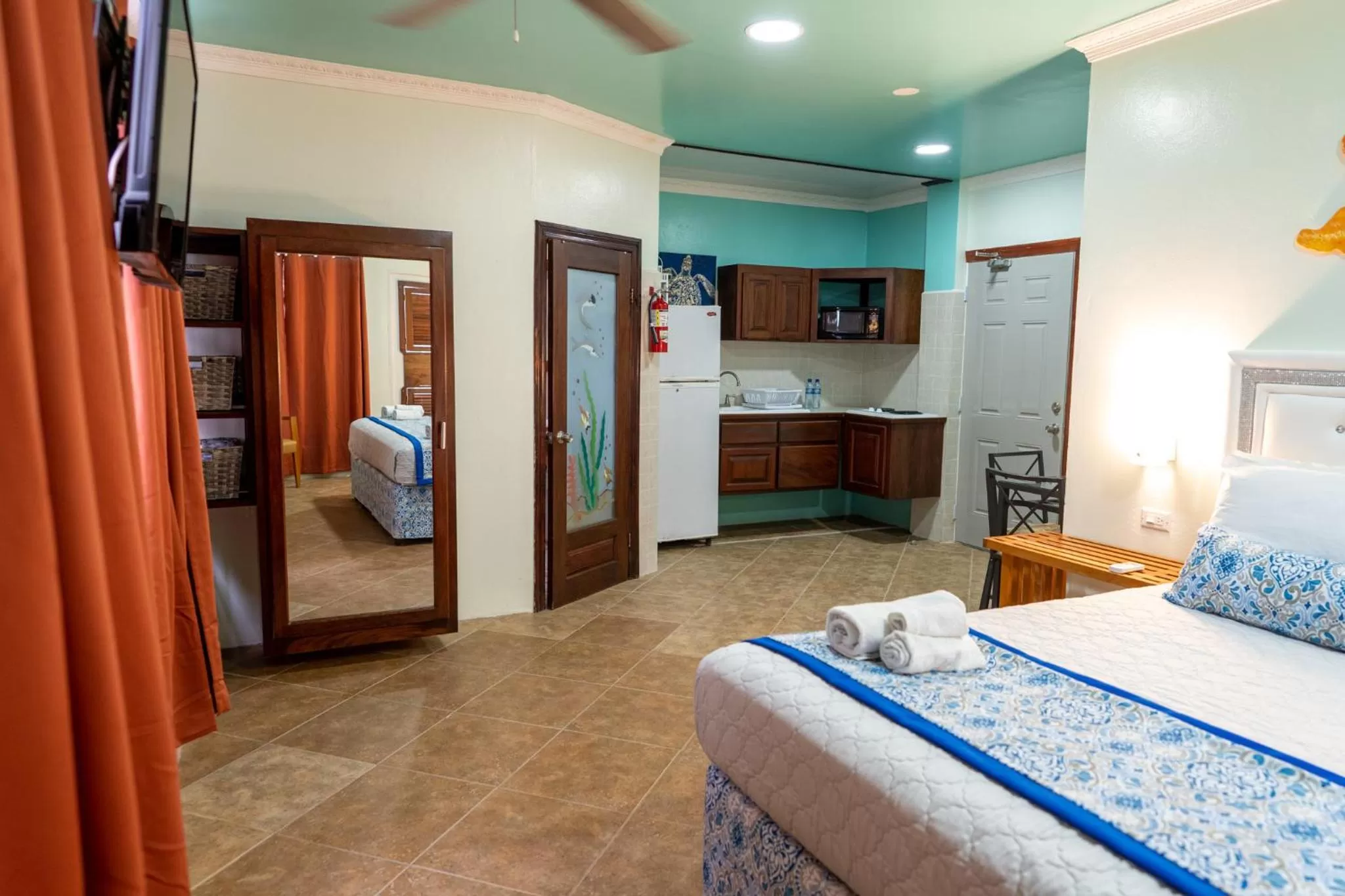 Photo of the whole room, Bed in Island Magic Beach Resort