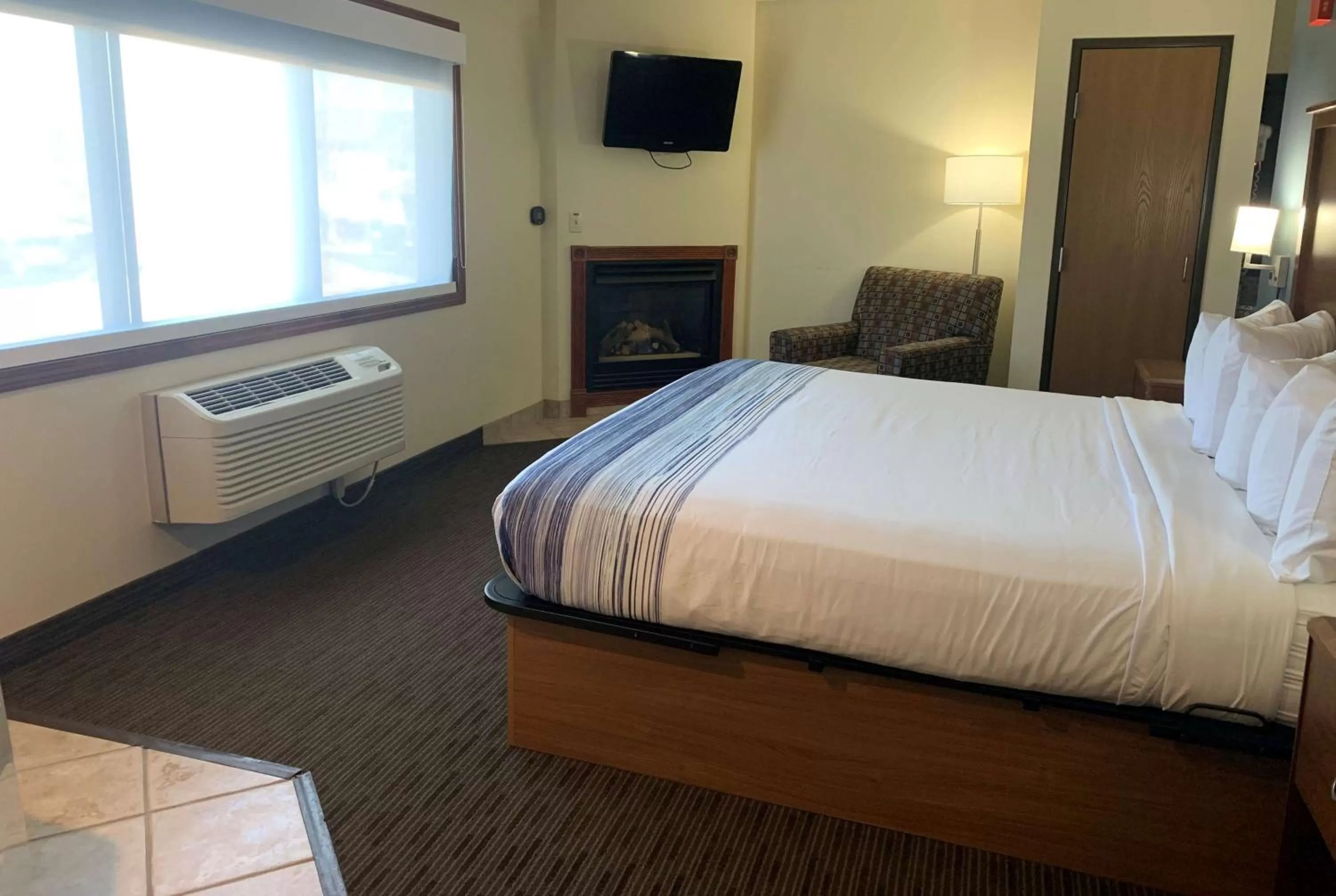 Bed in AmericInn by Wyndham Windsor Ft. Collins