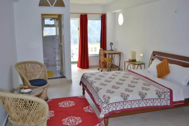 Photo of the whole room, Bed in Seventh Heaven Inn Rishikesh