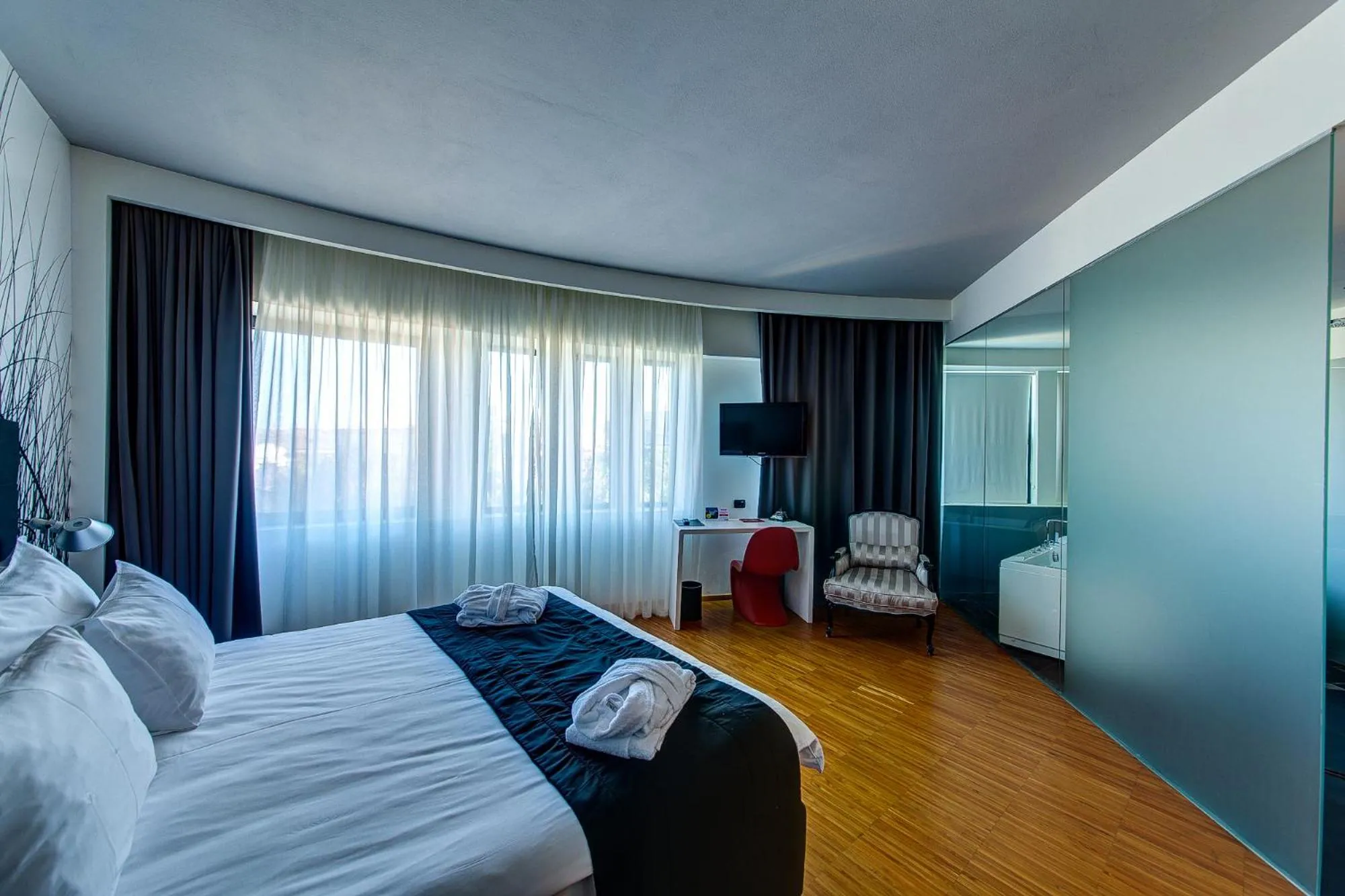 Bed in Sarroglia Hotel