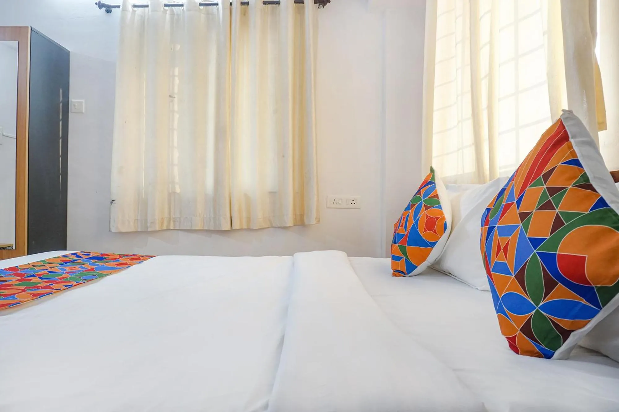 Bed in FabHotel Lake View - Chinmaya Vitthal Mandir